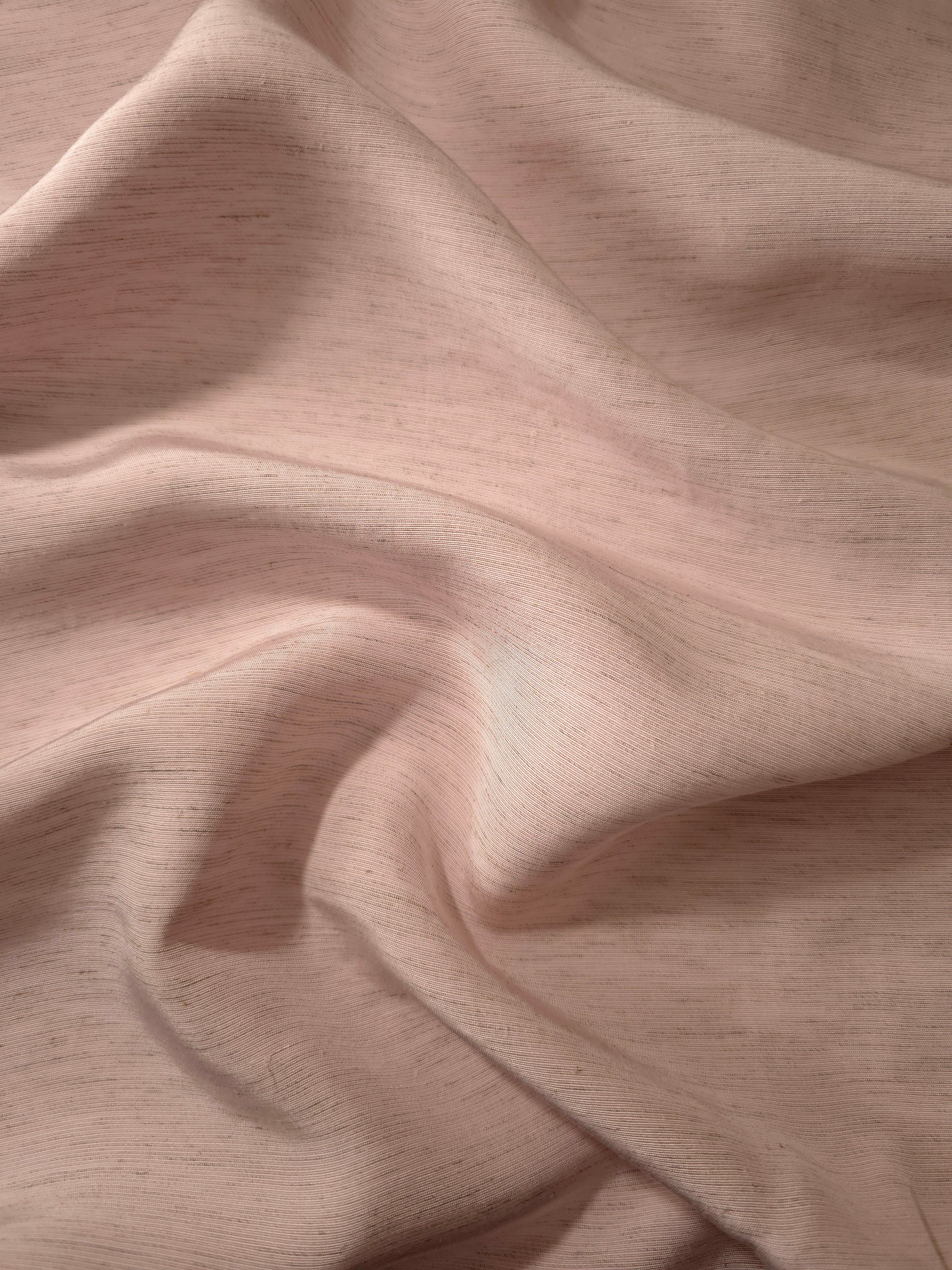 Soft dusty rose linen viscose plain fabric shown styled for abaya and modestwear designs.