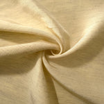 Soft baby yellow linen viscose plain fabric folded to show its lightweight, garment-ready texture.
