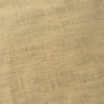 Soft baby yellow linen viscose plain fabric draped to show its soft structure, ideal for dressmaking.