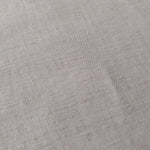 Soft pearl grey plain-weave linen viscose fabric, prized for its breathable hand and everyday apparel use.
