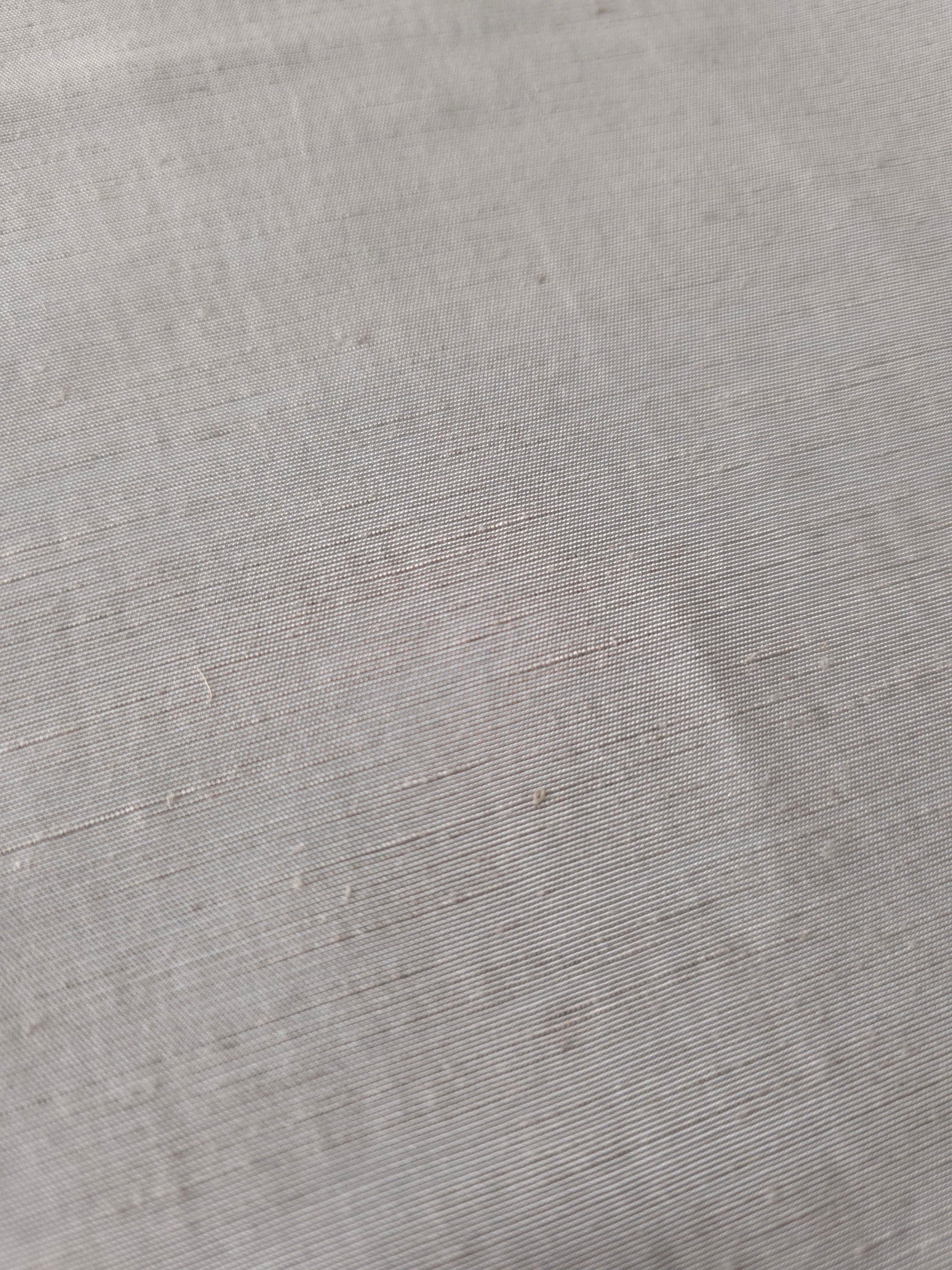 Soft pearl grey plain-weave linen viscose fabric, prized for its breathable hand and everyday apparel use.