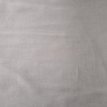 Draped view of soft pearl grey linen viscose plain fabric, showing the fluid drape used for dresses and skirts.