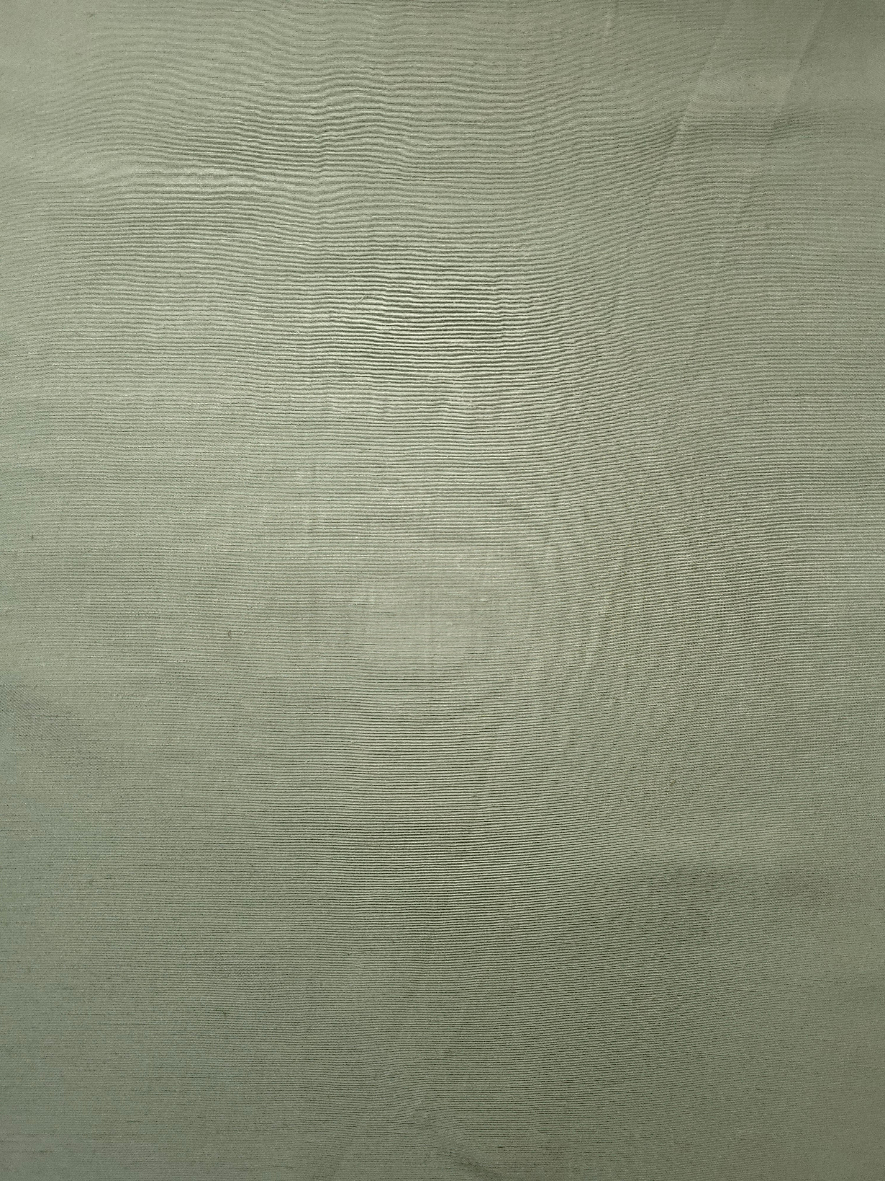 Muted sage grey linen viscose plain fabric with a smooth, breathable weave suited for warm-weather apparel.