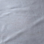 Cool grey-blue linen viscose plain fabric with a smooth, breathable weave suited for warm-weather apparel.