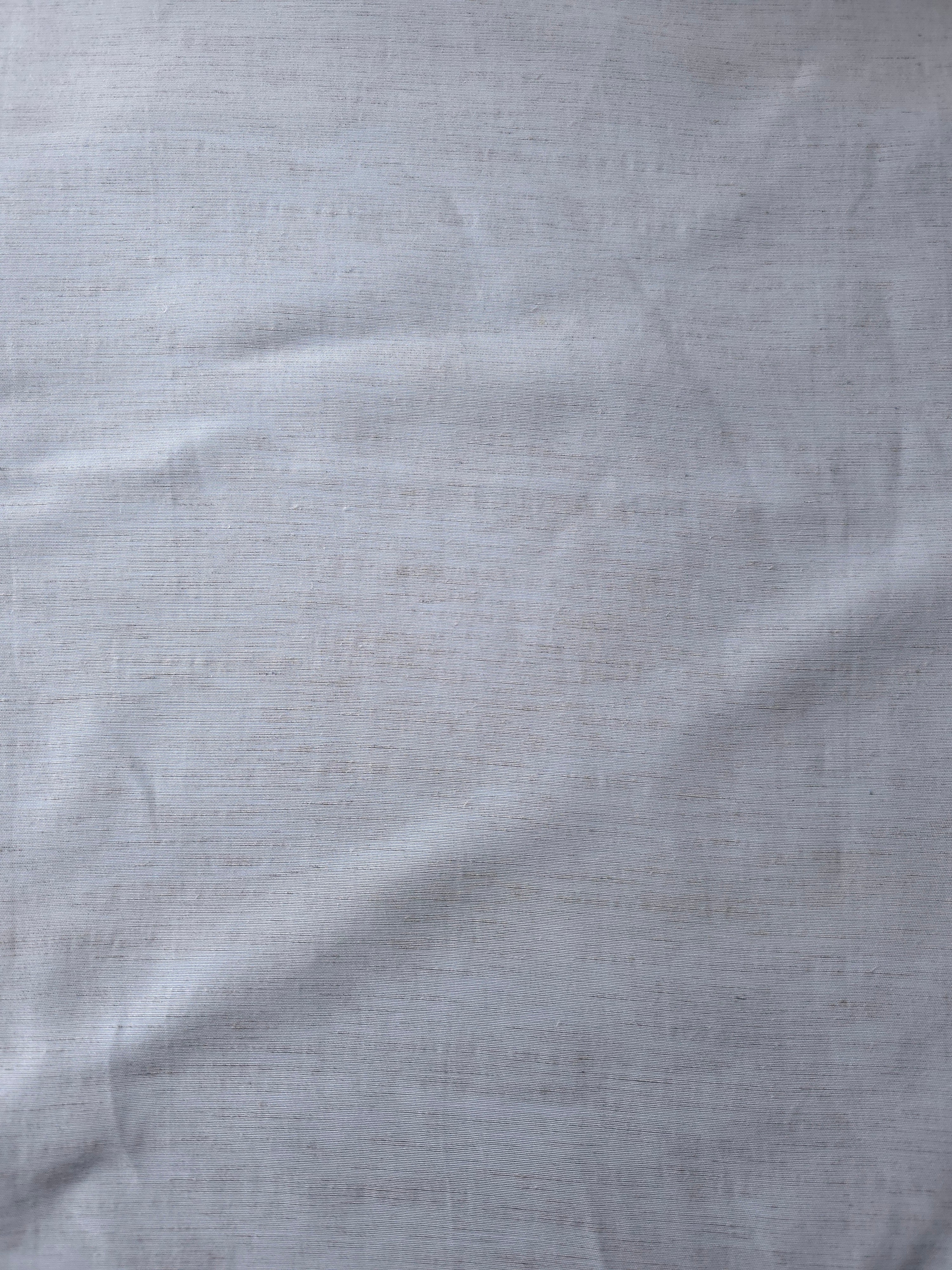 Cool grey-blue linen viscose plain fabric with a smooth, breathable weave suited for warm-weather apparel.