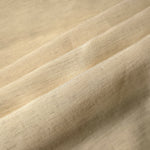 Texture view of soft cream linen viscose plain fabric highlighting its flowy, breathable finish.