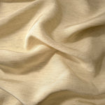 Soft cream linen viscose plain fabric styled for modestwear, with a matte, soft-touch finish.