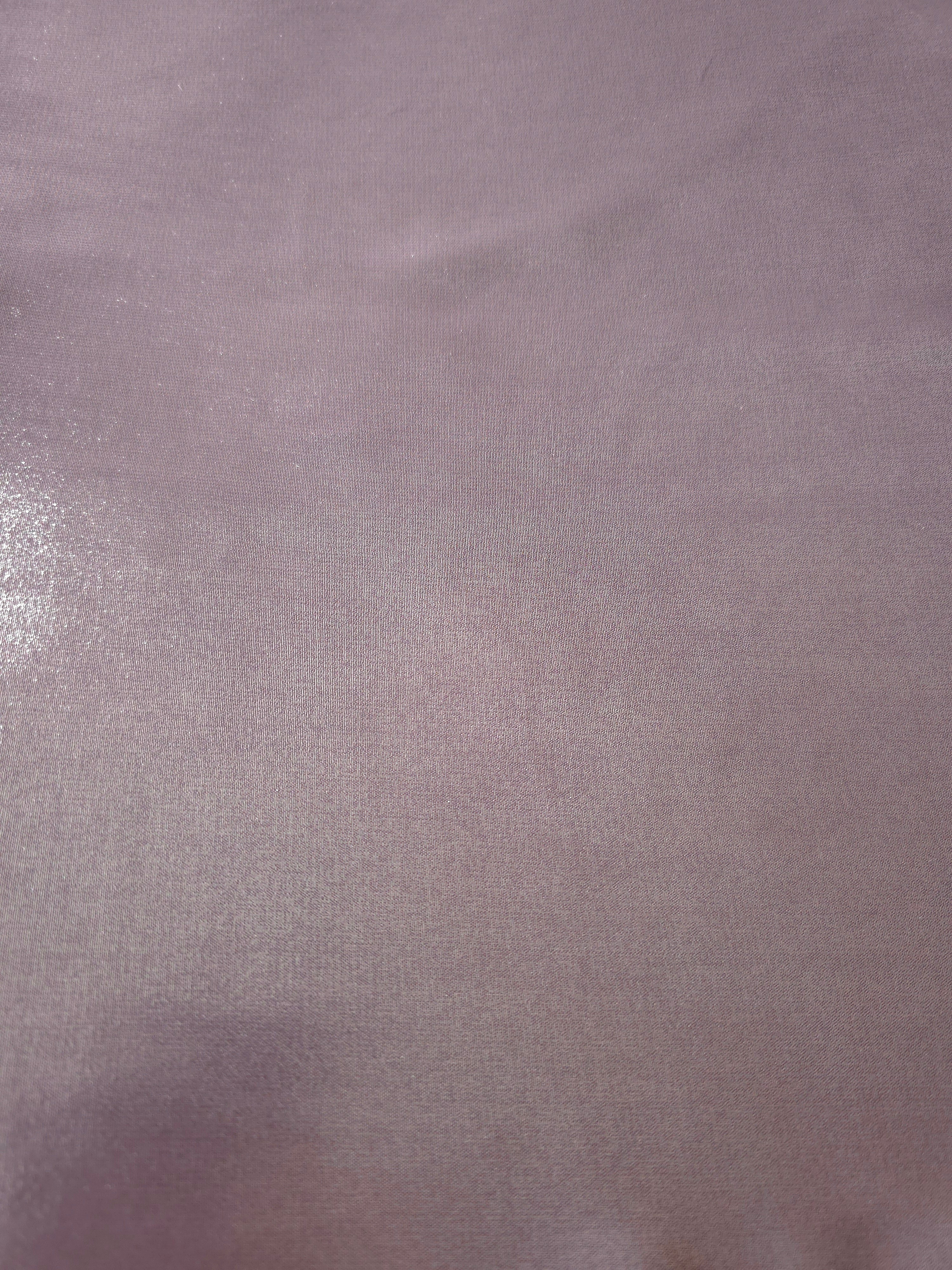 Dusty lilac fabric overview of liquid metallic shimmer chiffon fabric, showing lightweight reflective fabric texture and drape