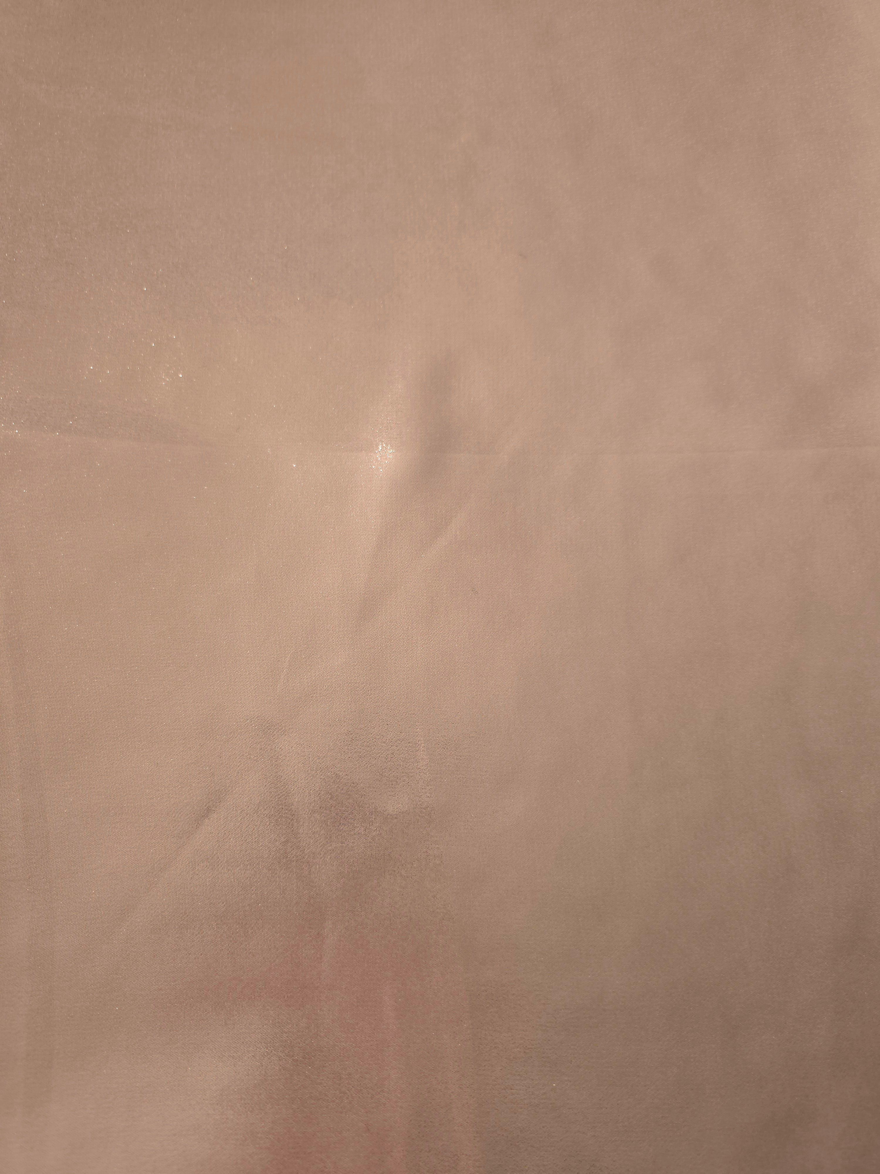 Dusty rose fabric overview of liquid metallic shimmer chiffon fabric, showing lightweight reflective fabric texture and drape
