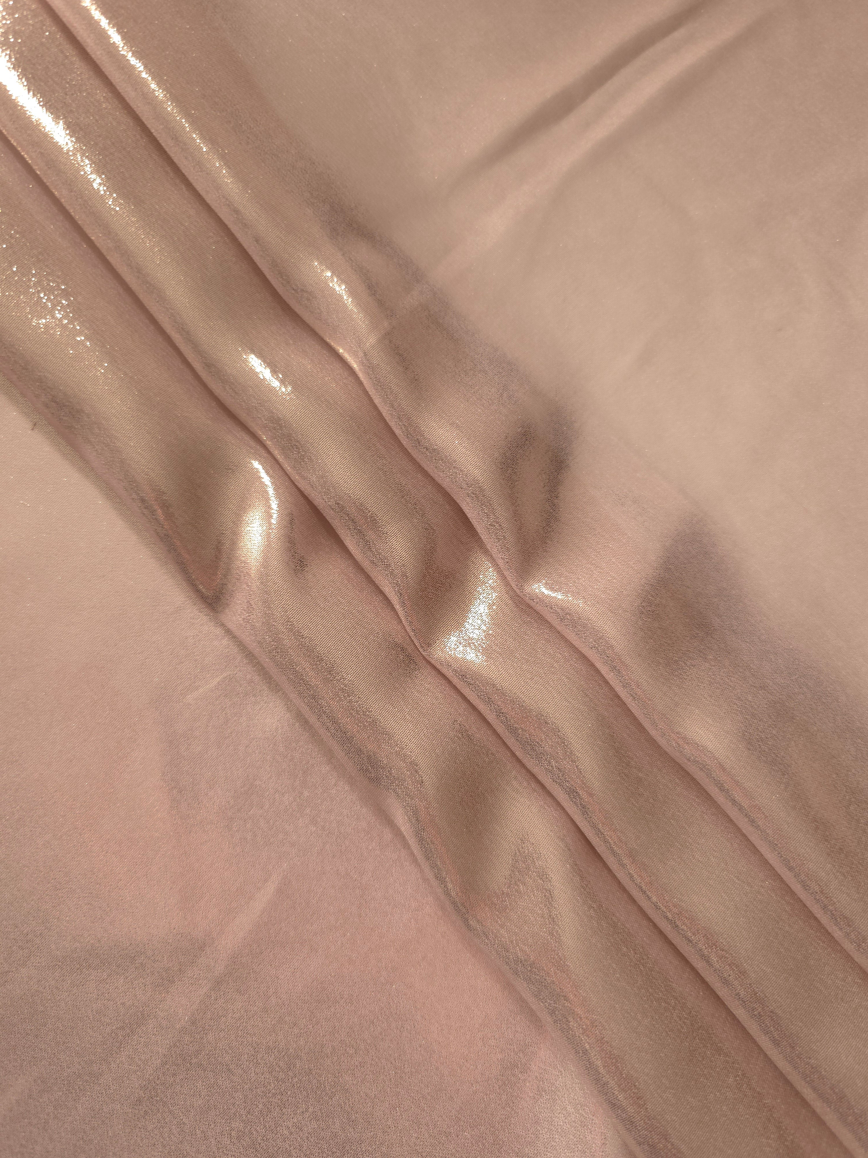 Dusty rose flowing folds of liquid metallic shimmer chiffon fabric, showing lightweight reflective fabric texture and drape