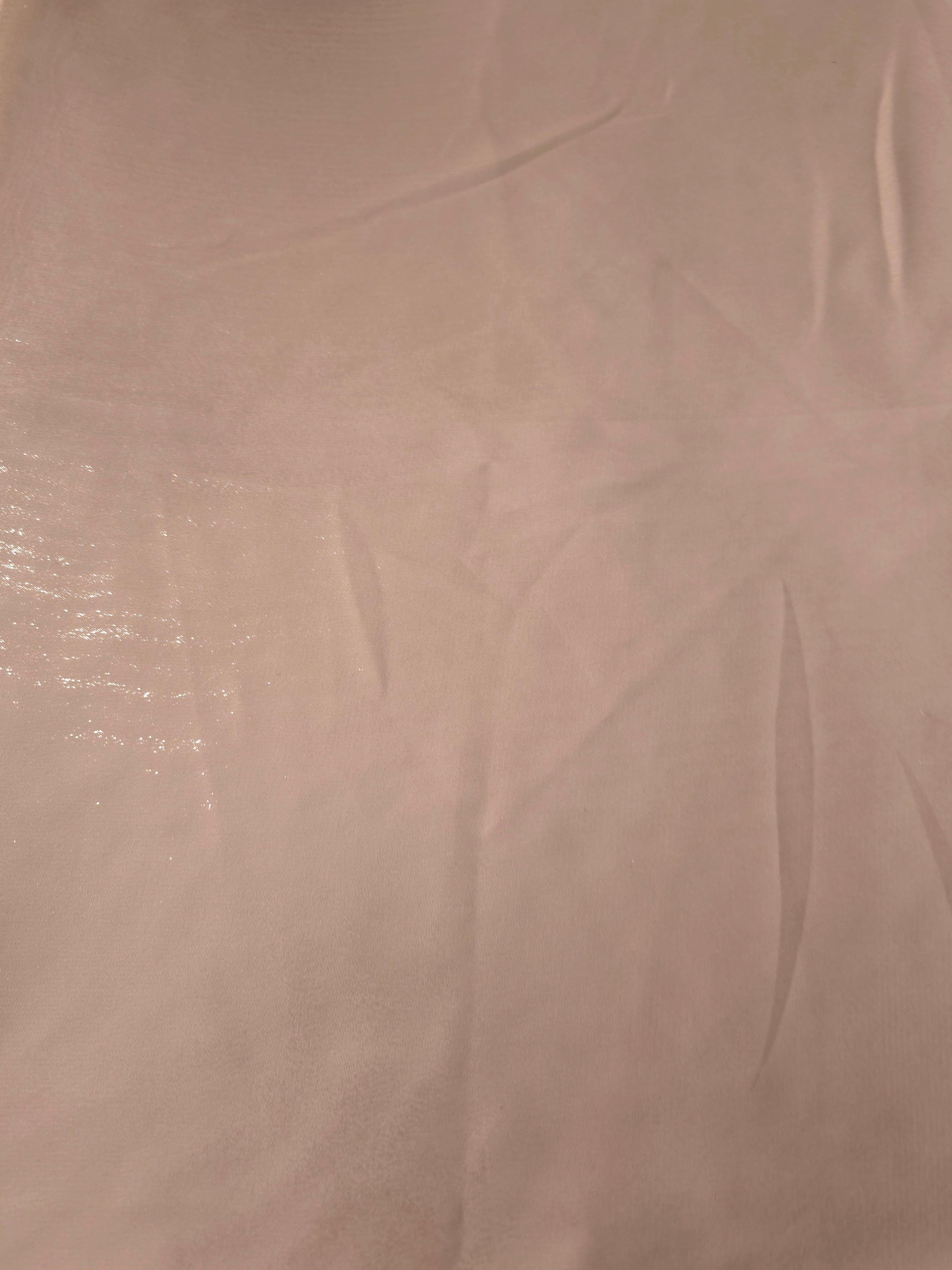 Mauve haze fabric overview of liquid metallic shimmer chiffon fabric, showing lightweight reflective fabric texture and drape