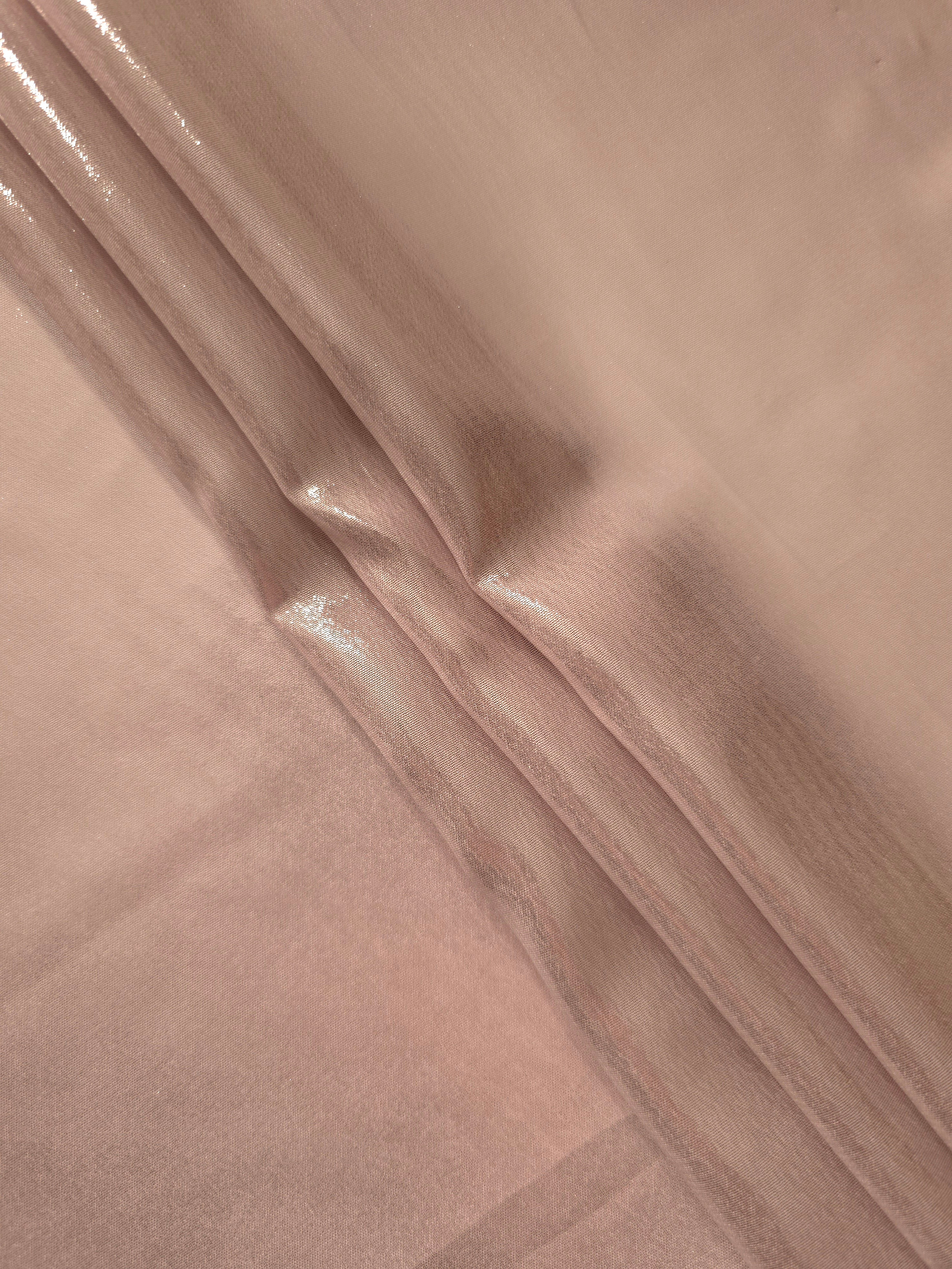 Mauve haze flowing folds of liquid metallic shimmer chiffon fabric, showing lightweight reflective fabric texture and drape