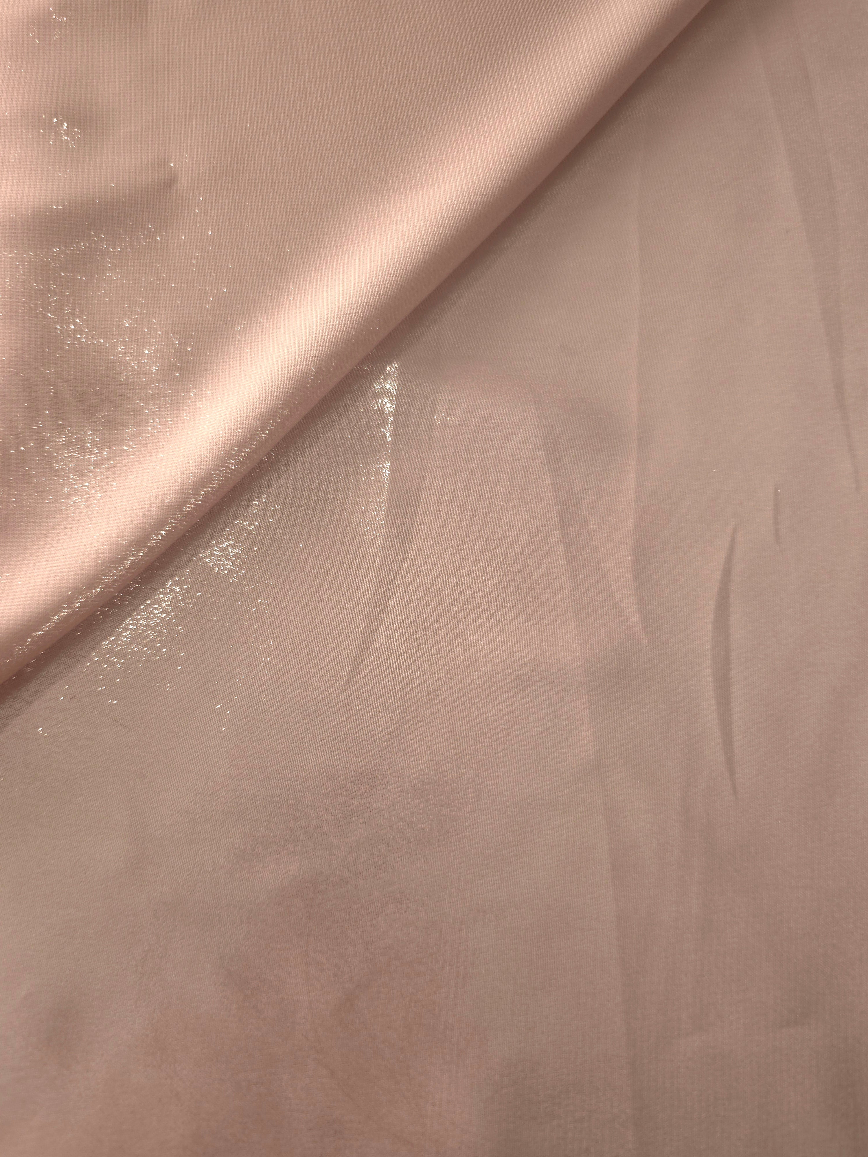 Mauve haze soft draping of liquid metallic shimmer chiffon fabric, showing lightweight reflective fabric texture and drape