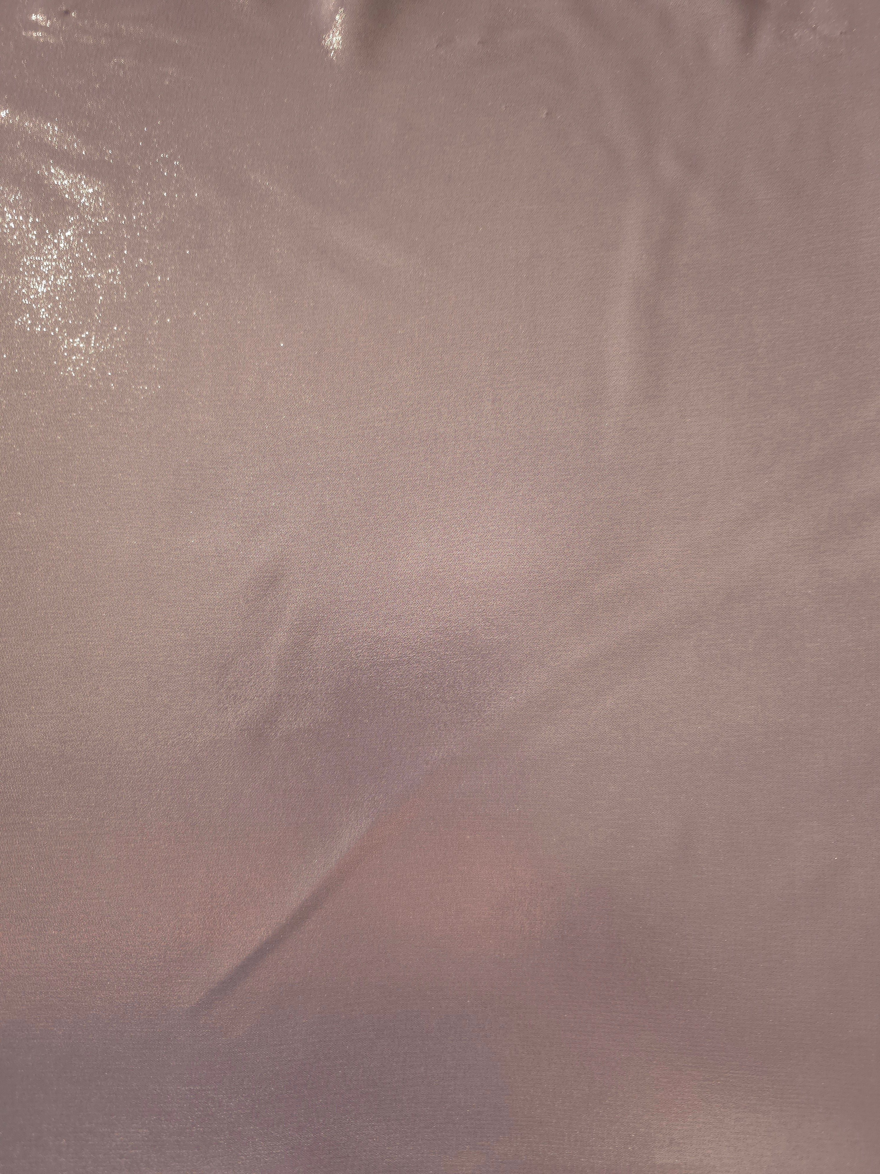 Mauve taupe fabric overview of liquid metallic shimmer chiffon fabric, showing lightweight reflective fabric texture and drape