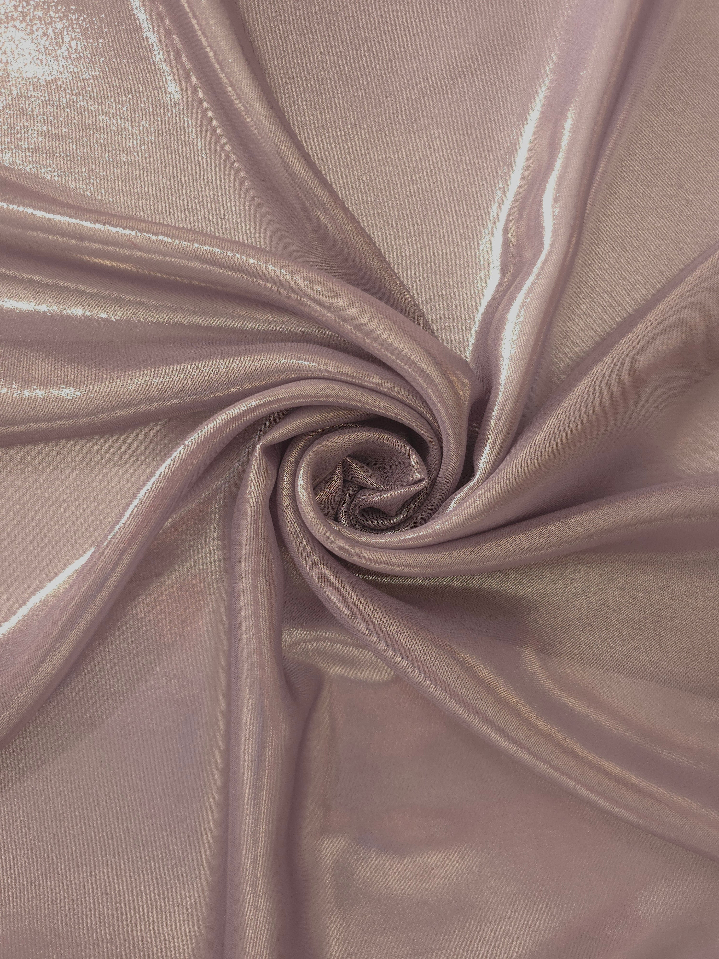 Mauve taupe shimmer close-up of liquid metallic shimmer chiffon fabric, showing lightweight reflective fabric texture and drape