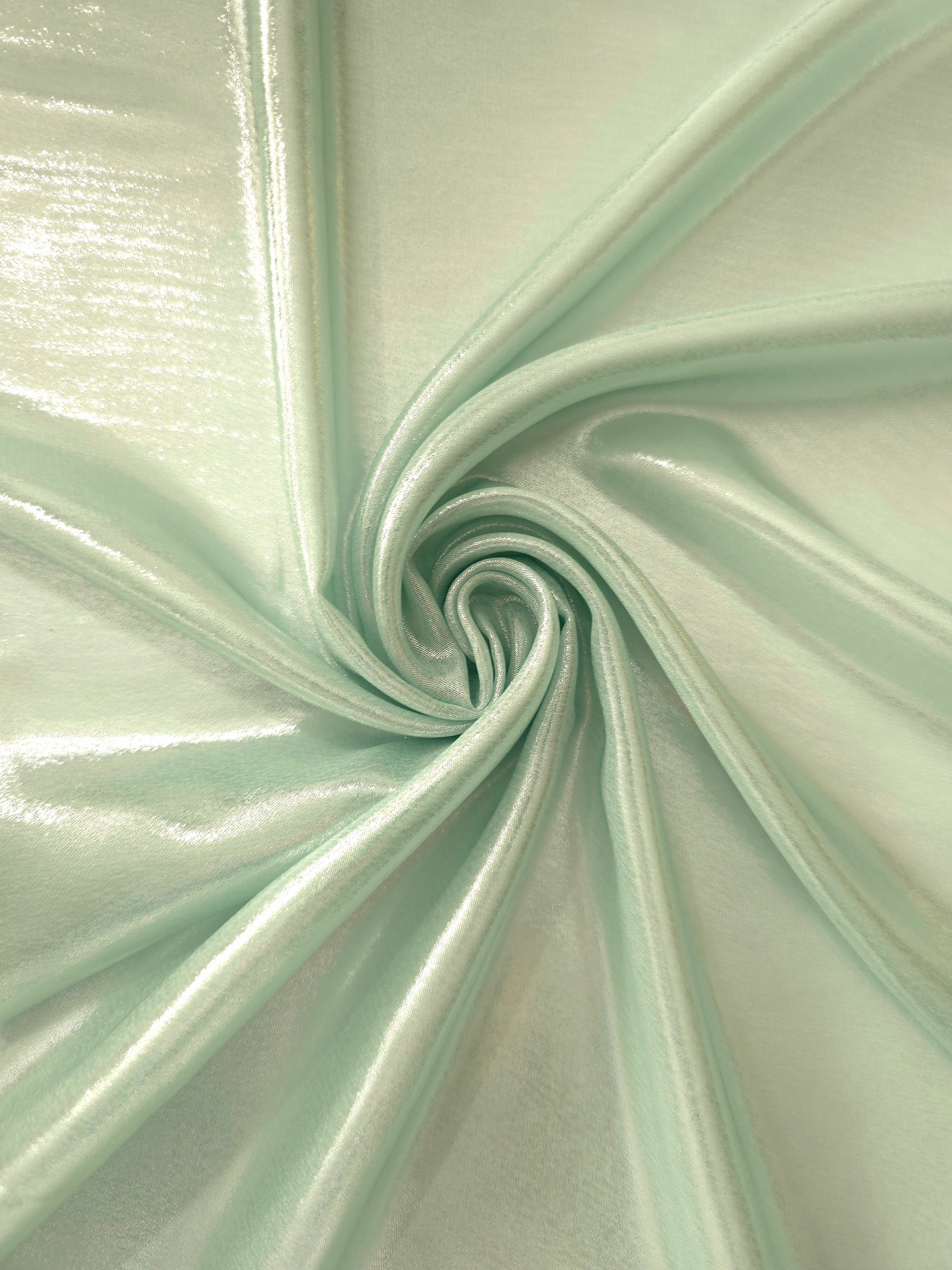 Mint frost shimmer close-up of liquid metallic shimmer chiffon fabric, showing lightweight reflective fabric texture and drape