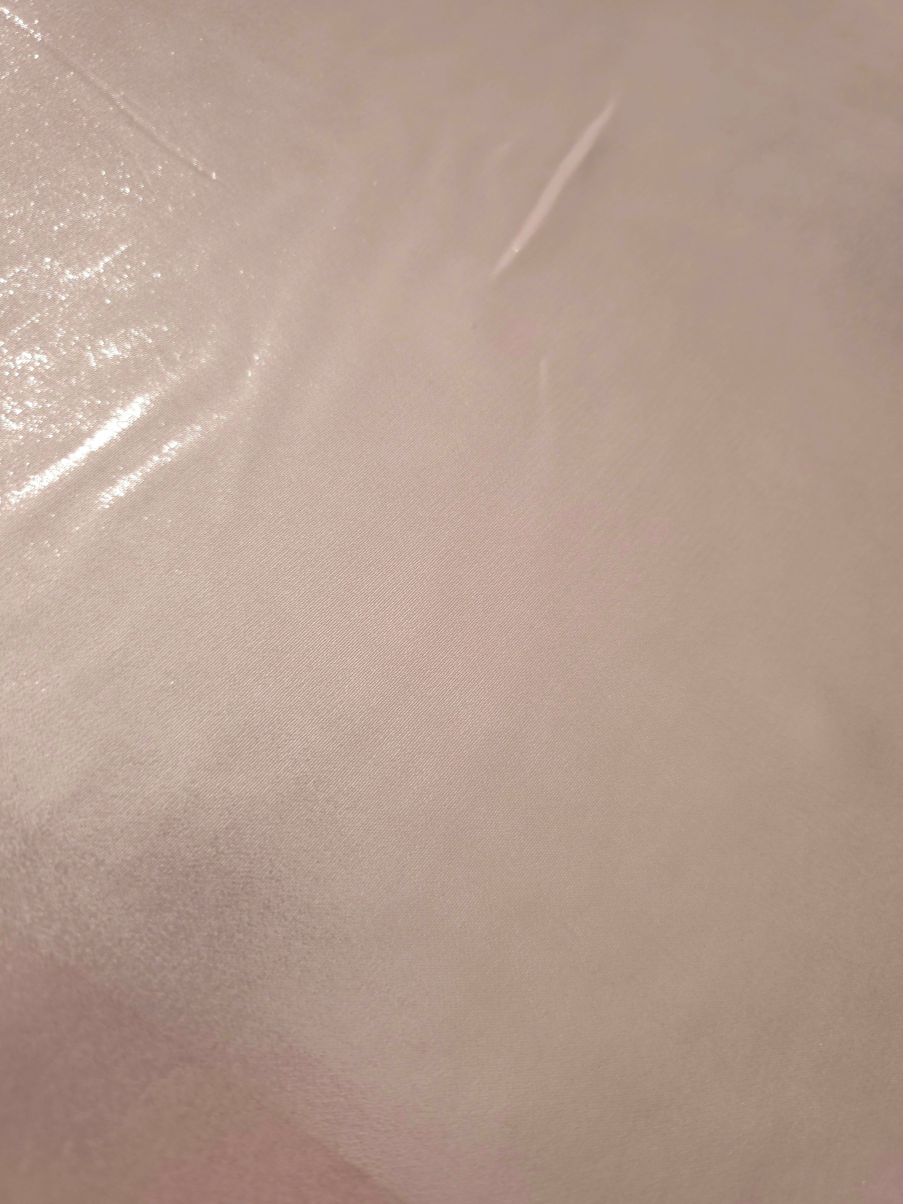 Rose blush fabric overview of liquid metallic shimmer chiffon fabric, showing lightweight reflective fabric texture and drape