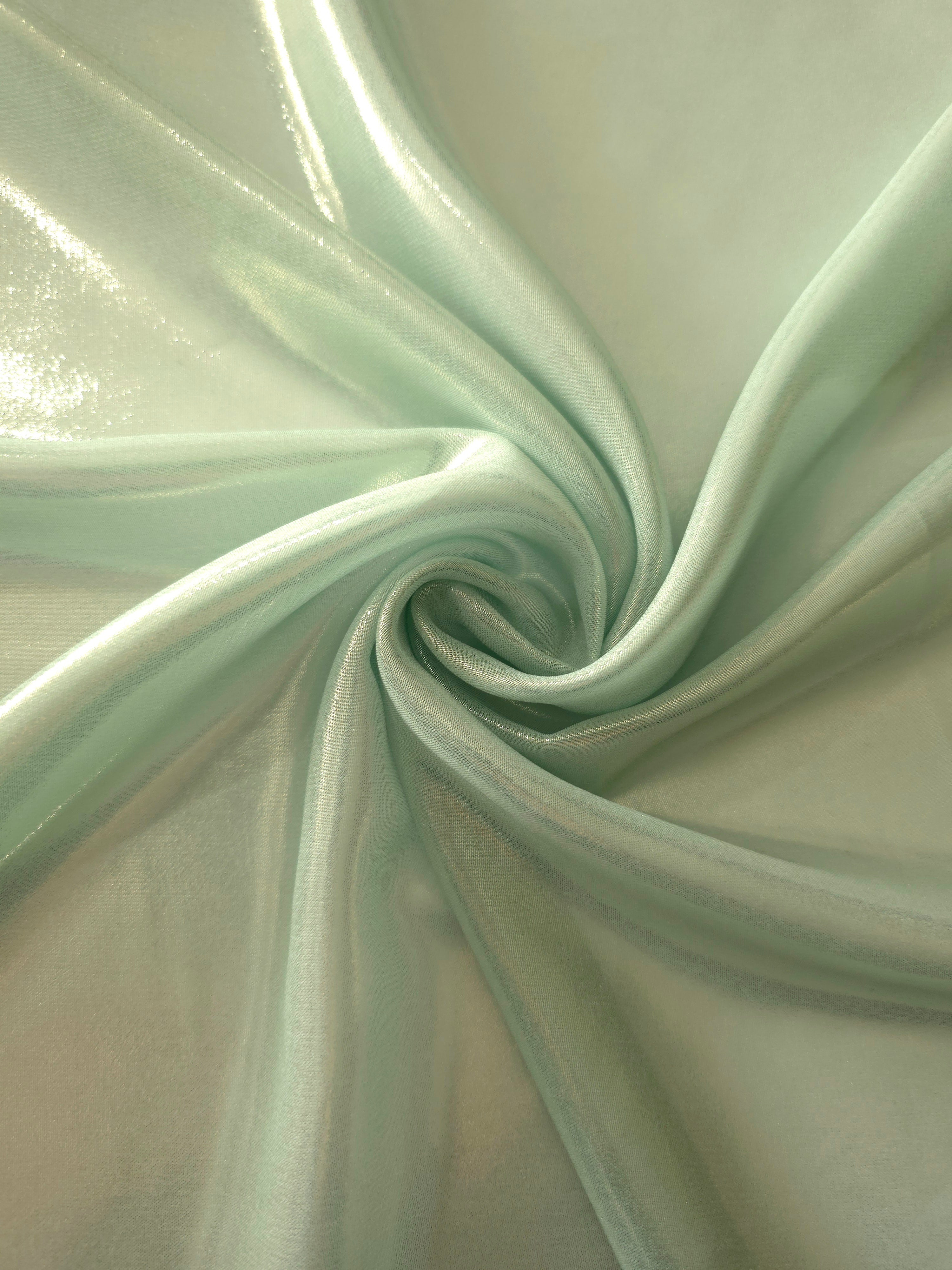 Sage silver shimmer close-up of liquid metallic shimmer chiffon fabric, showing lightweight reflective fabric texture and drape