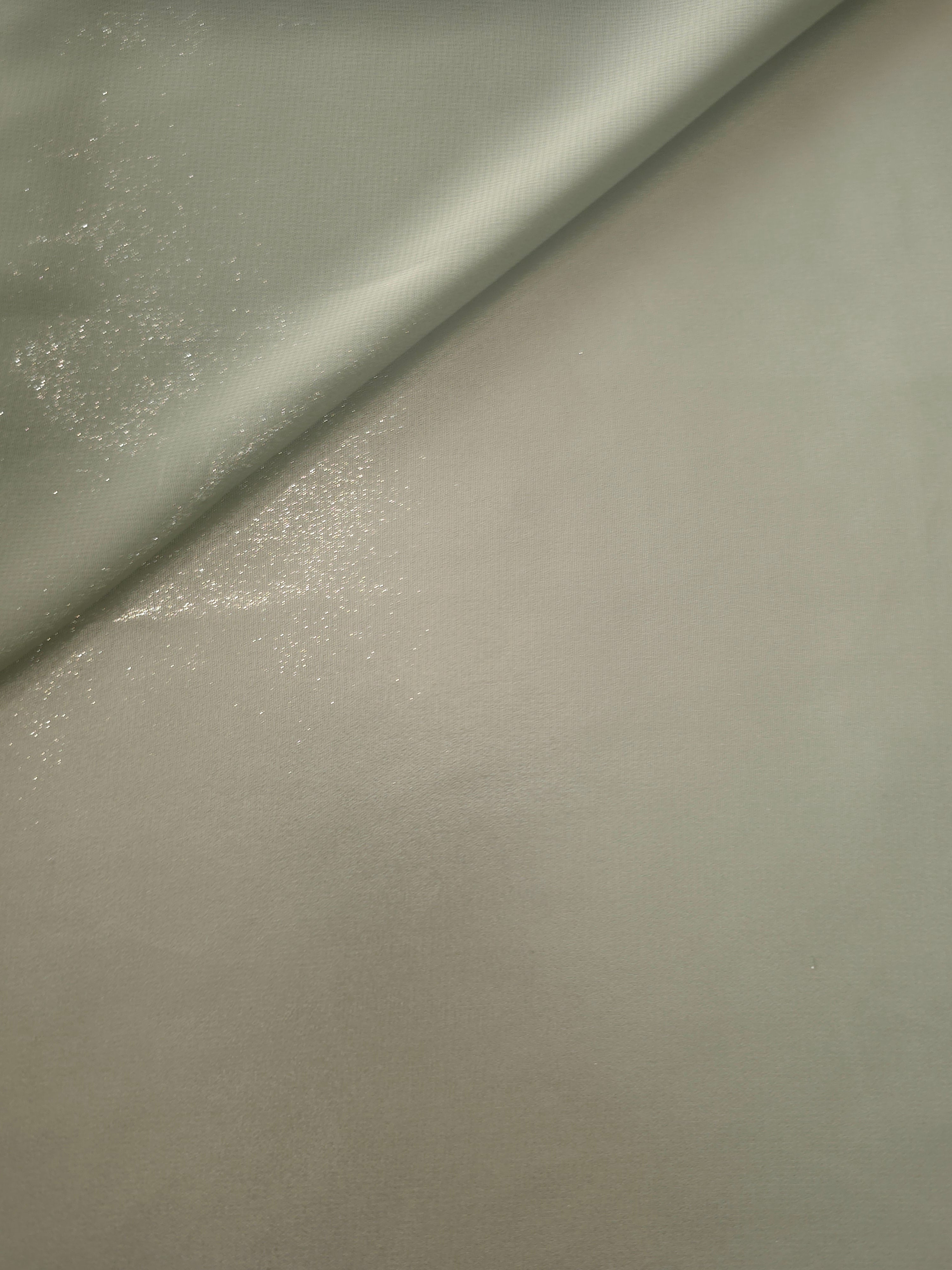 Stone greige soft draping of liquid metallic shimmer chiffon fabric, showing lightweight reflective fabric texture and drape