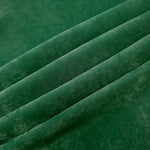 Emerald Green sandwashed polyamide fabric showing a soft folded drape