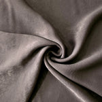 Smoked Charcoal sandwashed polyamide fabric showing a soft folded drape