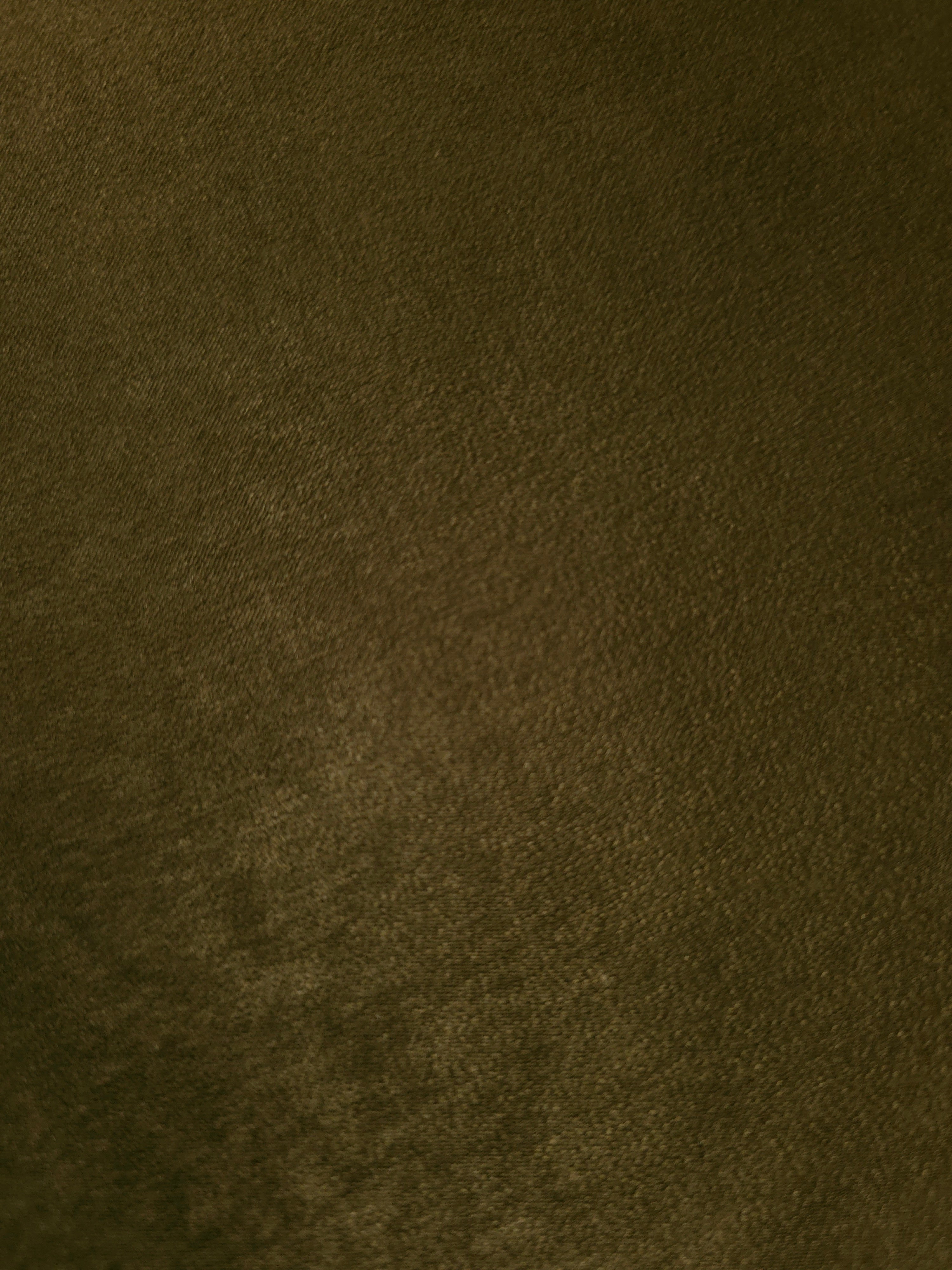 Dark Khaki sandwashed polyamide fabric showing a soft folded drape