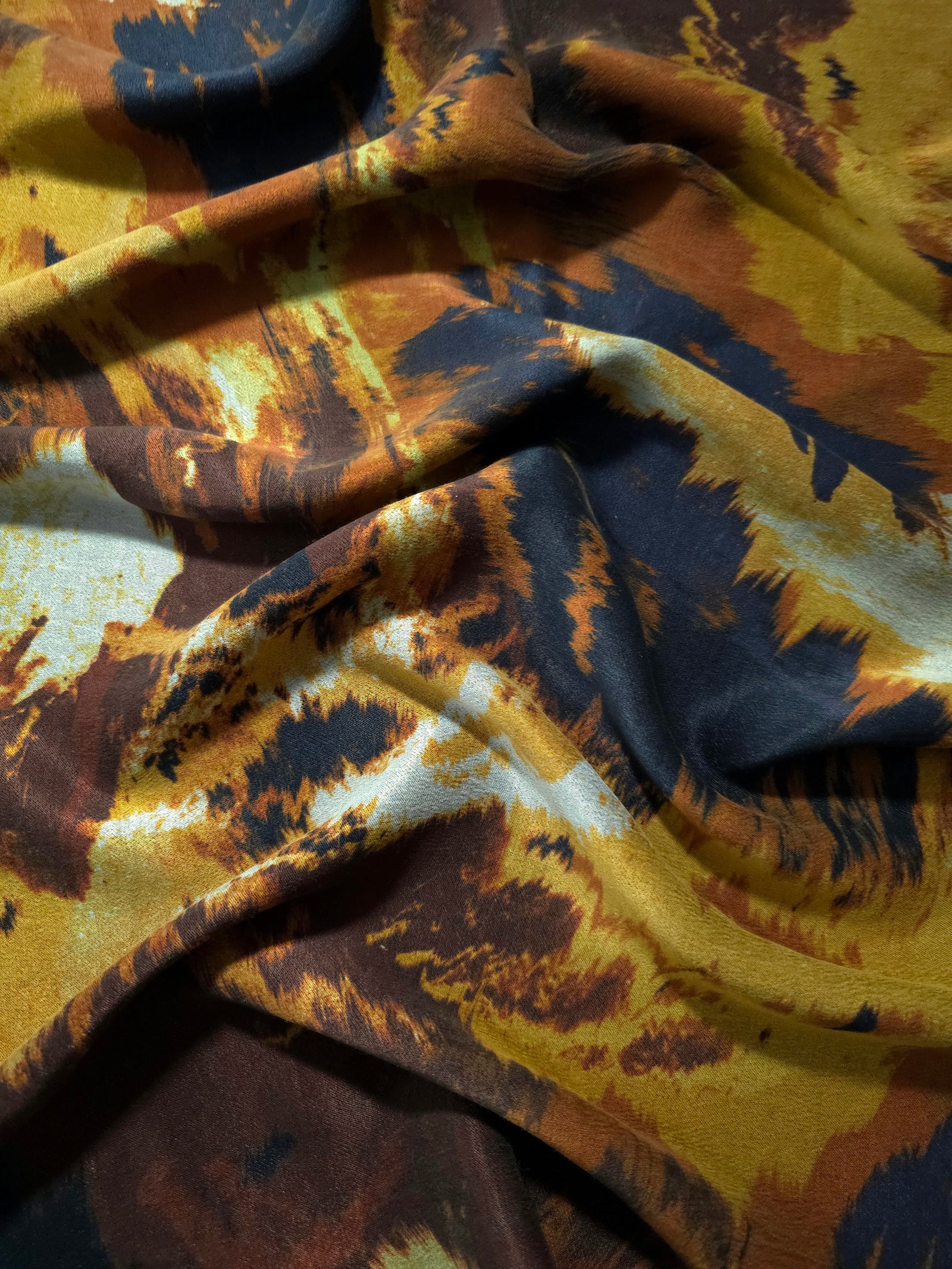 Soft drape folds of A-Gri D6957IJ9 lyocell viscose digital print fabric.