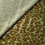 Close-up texture of Bej D7586IJ4 leopard lyocell viscose digital print fabric.