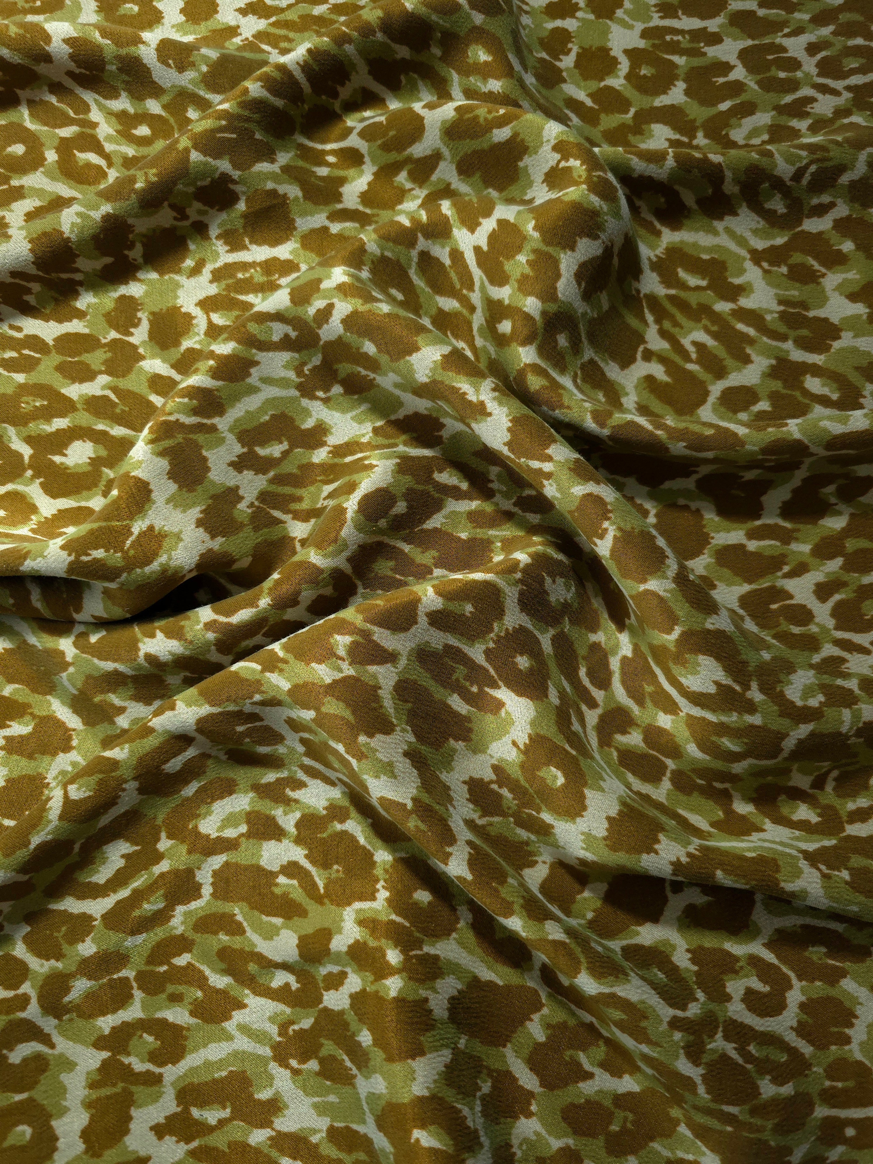 Soft drape folds of Bej D7586IJ4 leopard lyocell viscose digital print fabric.