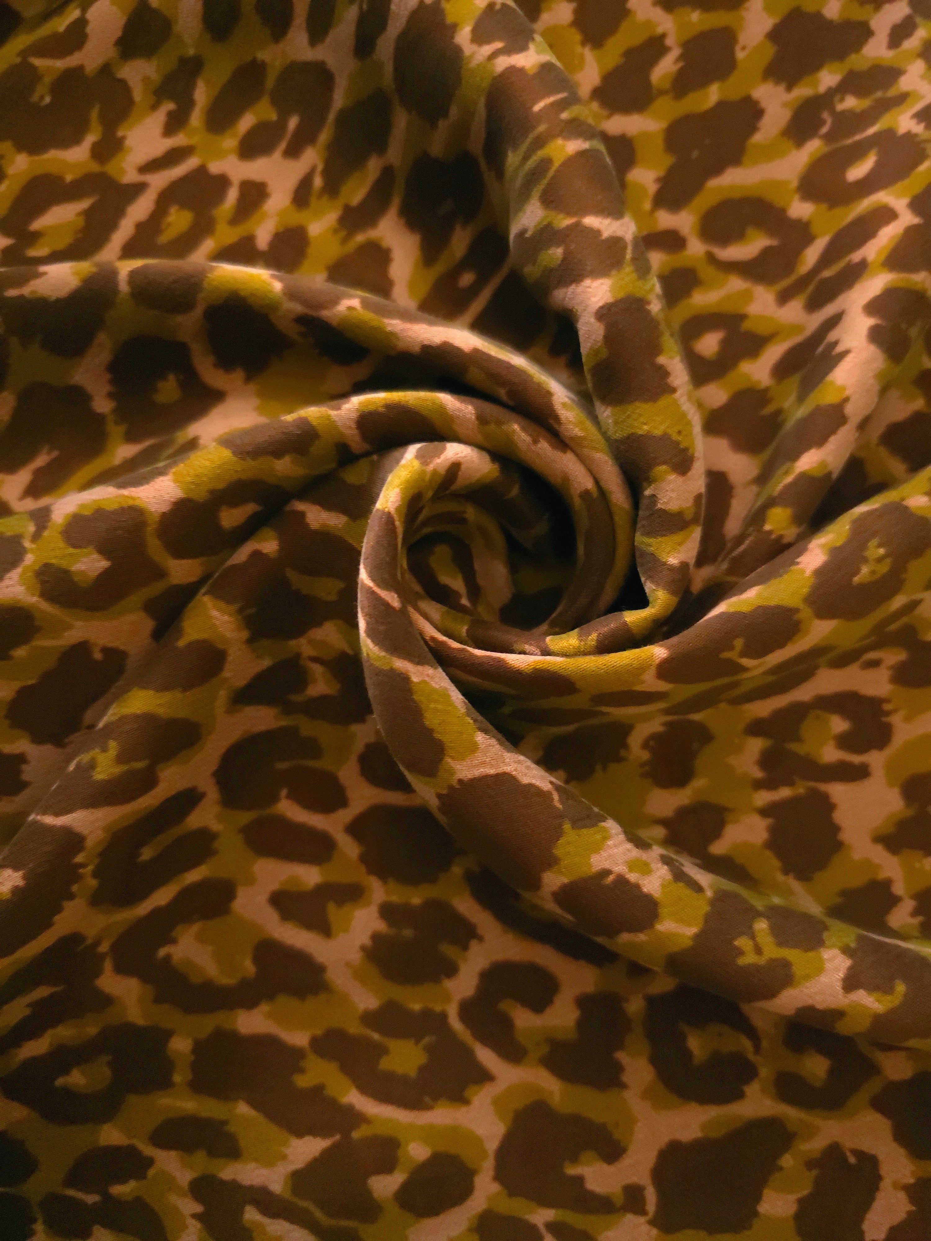 Angled print detail of Kahve D7586IJ4 leopard lyocell viscose digital print fabric.