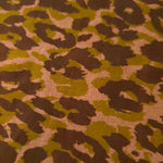 Close-up texture of Kahve D7586IJ4 leopard lyocell viscose digital print fabric.