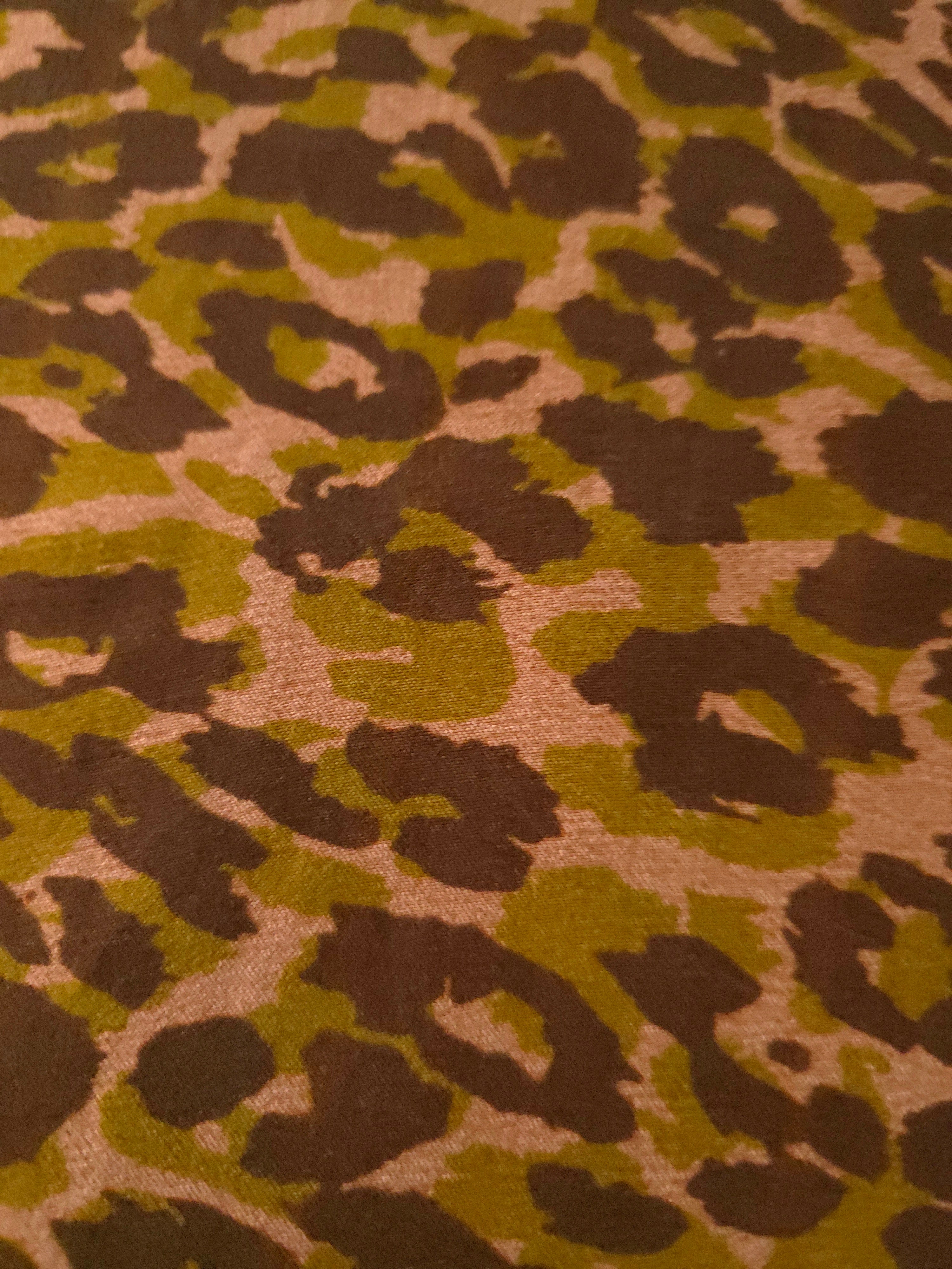 Close-up texture of Kahve D7586IJ4 leopard lyocell viscose digital print fabric.