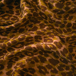 Soft drape folds of Kahve D7586IJ4 leopard lyocell viscose digital print fabric.
