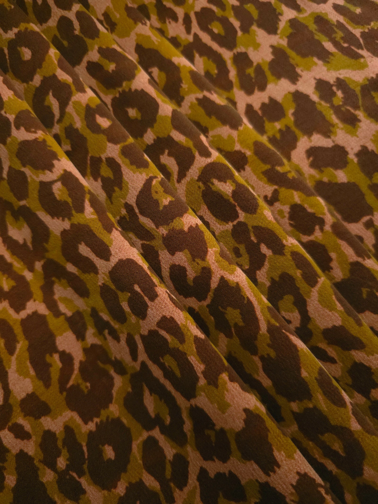 Swirl drape view of Kahve D7586IJ4 leopard lyocell viscose digital print fabric.