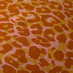 Close-up texture of Pudra D7586IJ4 leopard lyocell viscose digital print fabric.