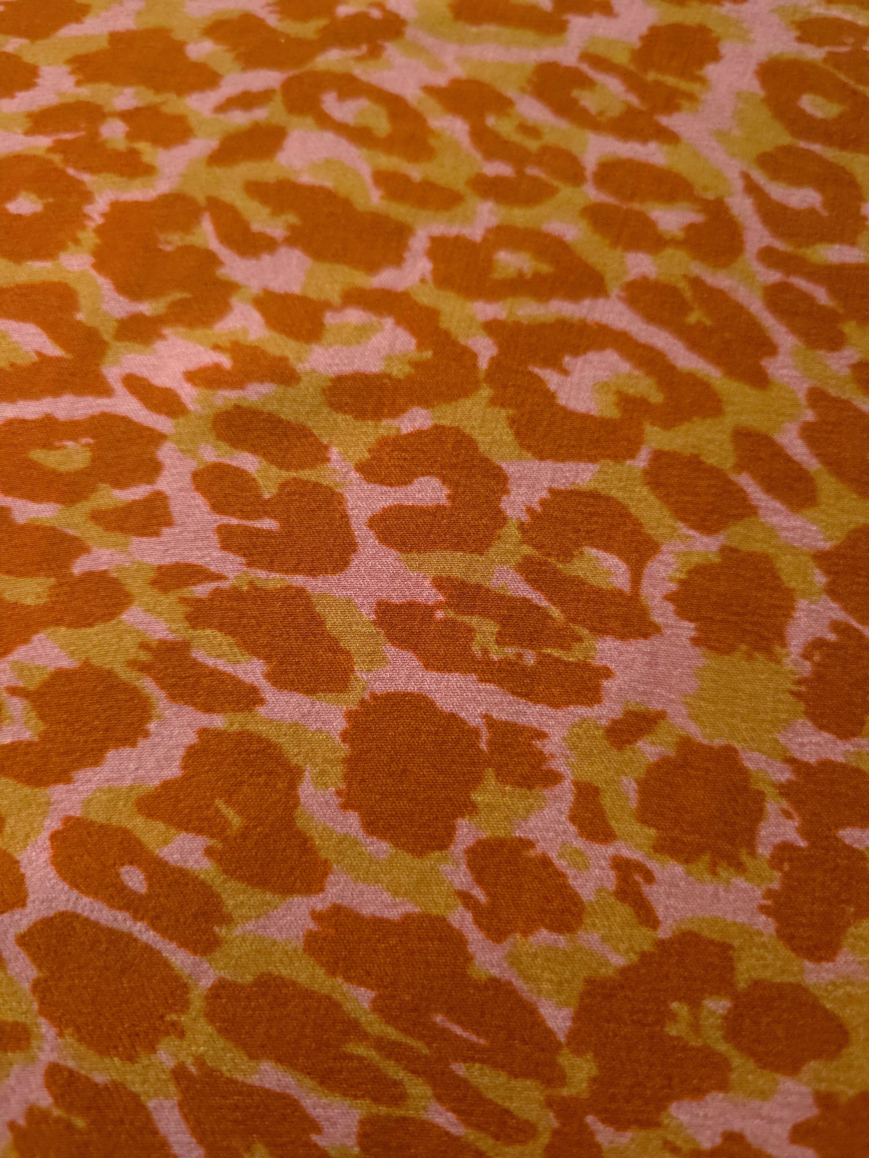 Close-up texture of Pudra D7586IJ4 leopard lyocell viscose digital print fabric.