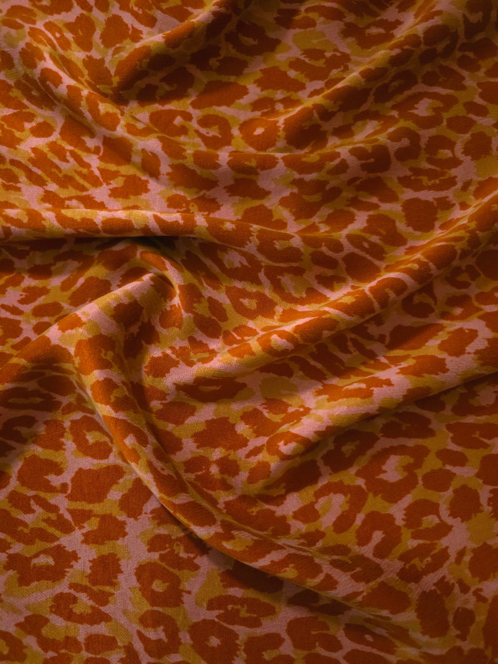 Soft drape folds of Pudra D7586IJ4 leopard lyocell viscose digital print fabric.