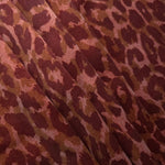 Angled print detail of Taba D7586IJ4 leopard lyocell viscose digital print fabric.