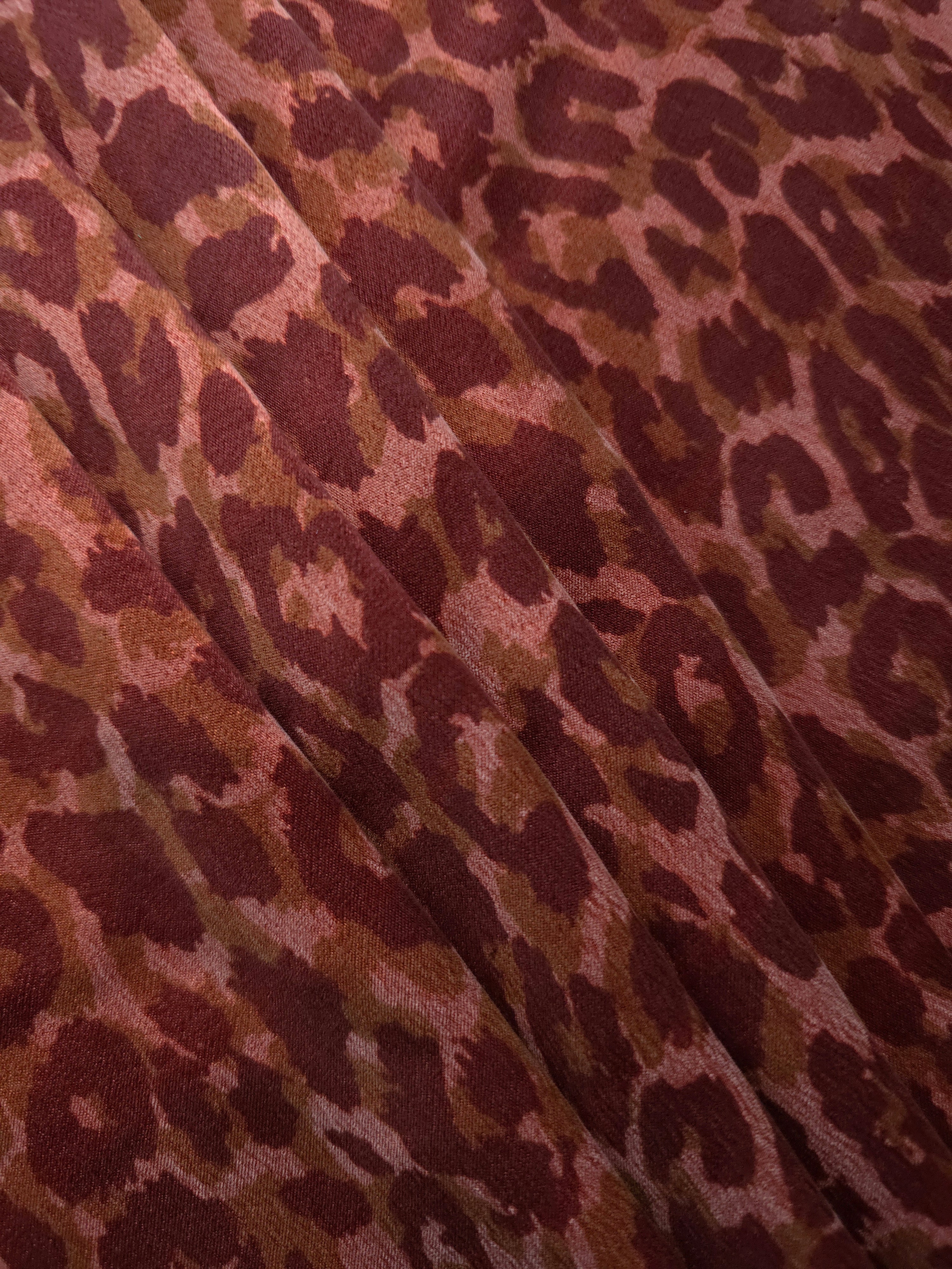 Angled print detail of Taba D7586IJ4 leopard lyocell viscose digital print fabric.