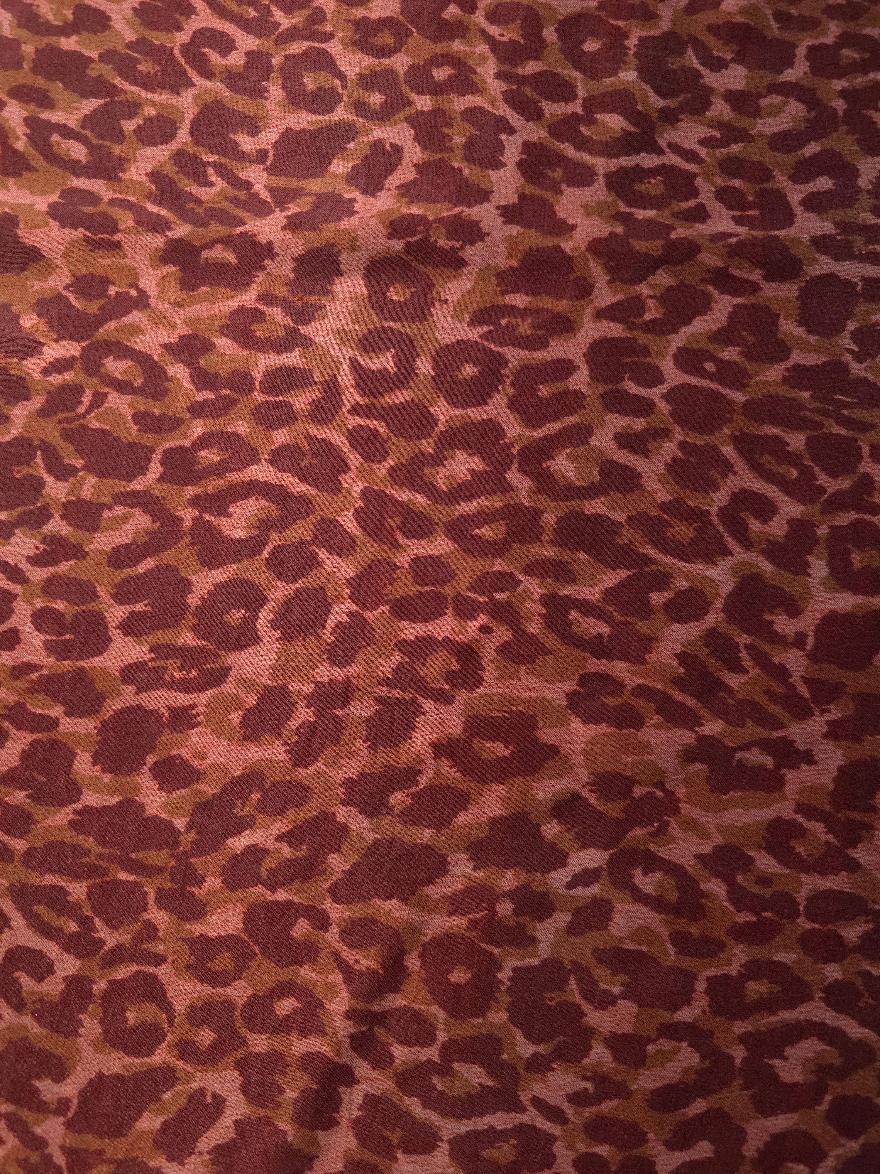 Pattern overview of Taba D7586IJ4 leopard lyocell viscose digital print fabric.