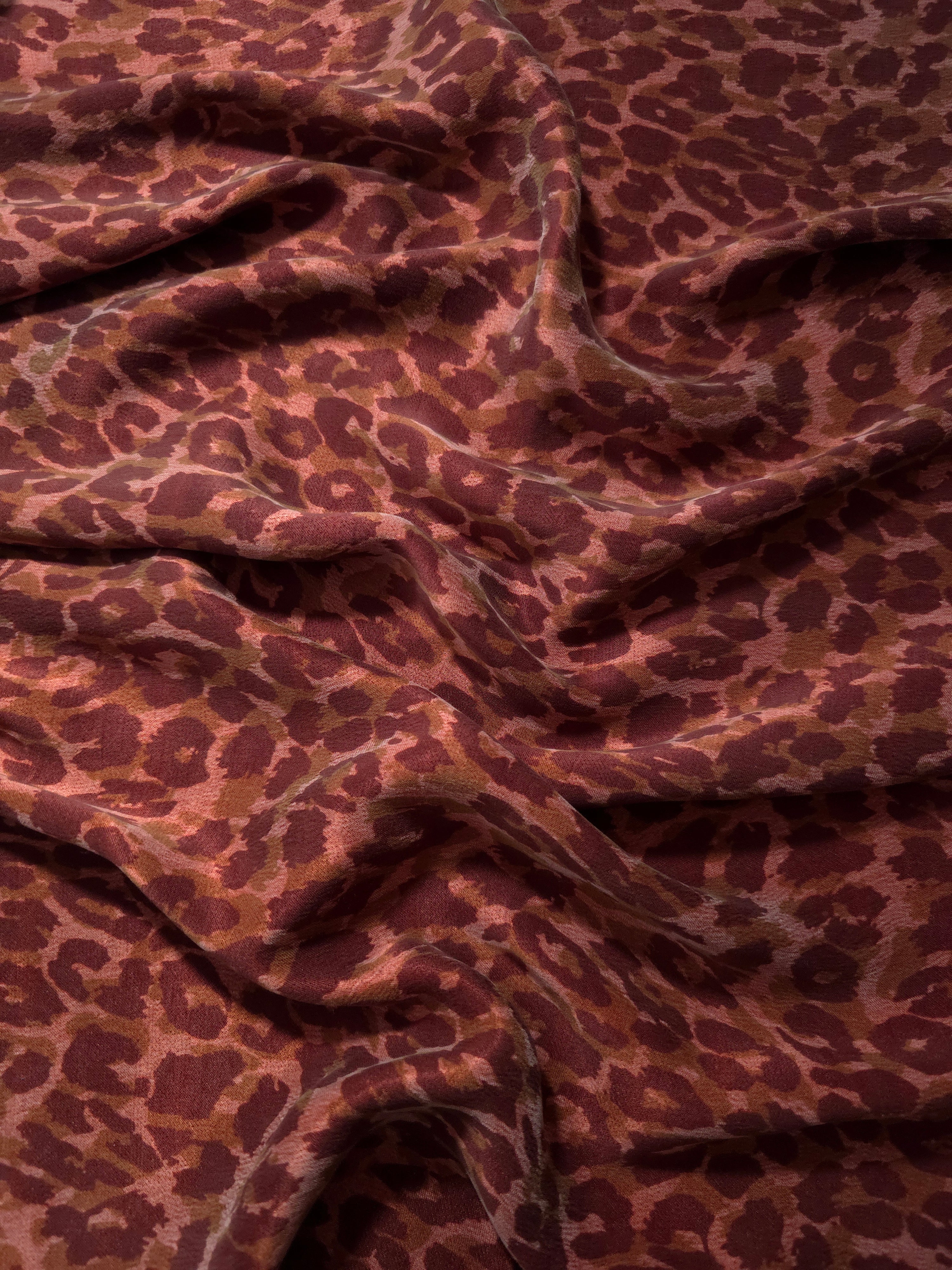 Soft drape folds of Taba D7586IJ4 leopard lyocell viscose digital print fabric.