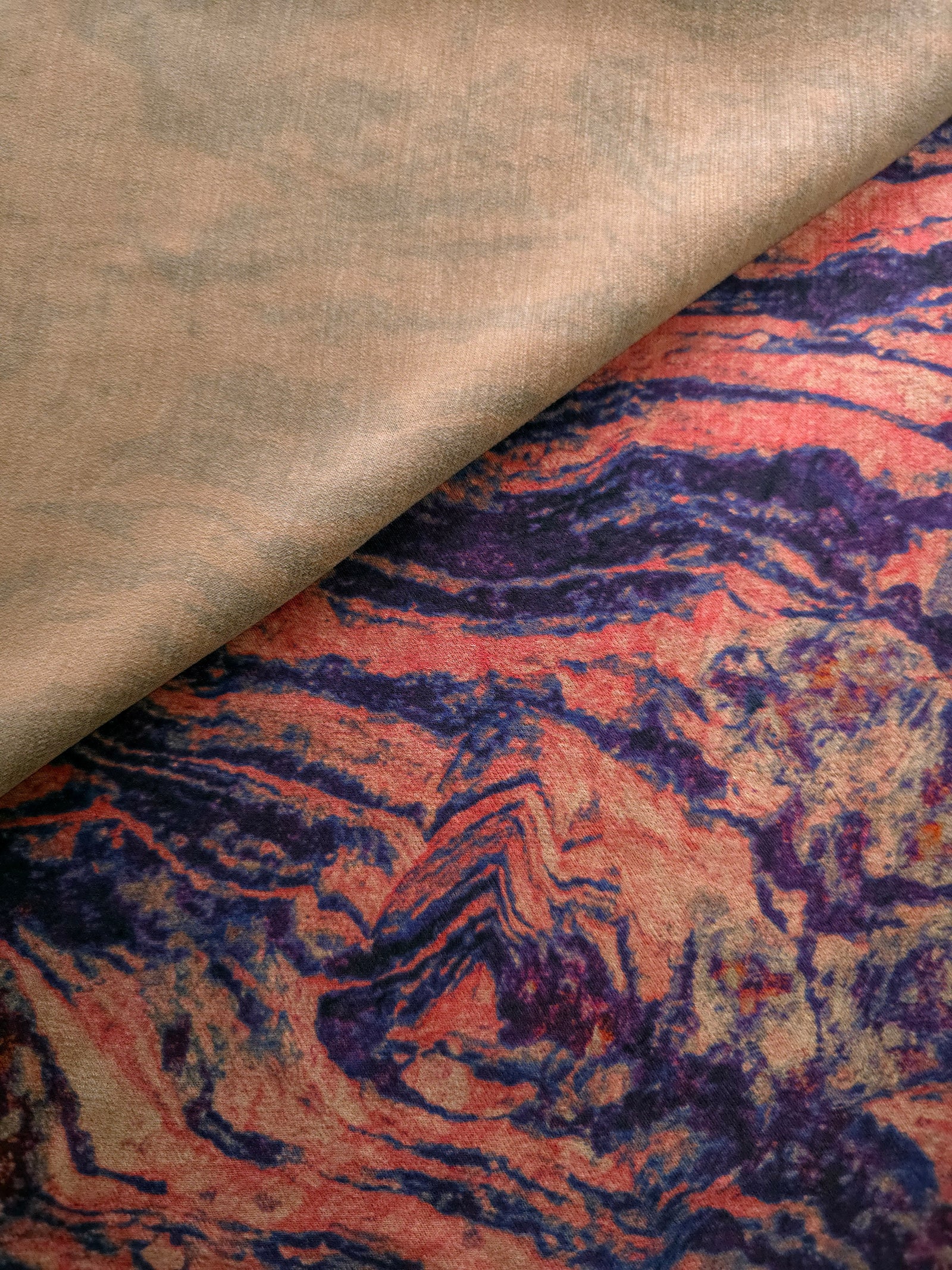Soft drape folds of Kahve D7587IJ9 lyocell viscose digital print fabric.
