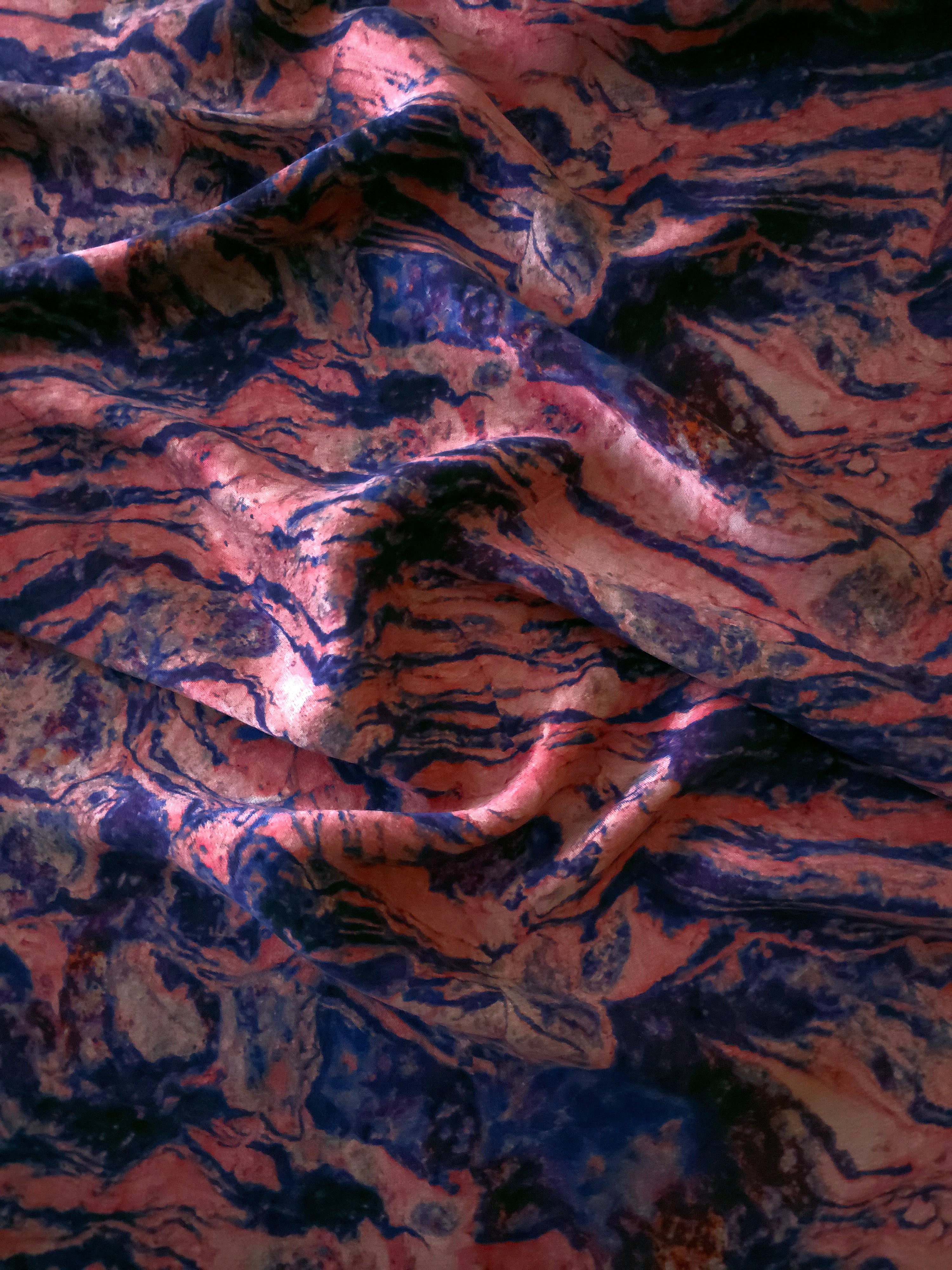 Soft drape folds of Pudra D7587IJ9 lyocell viscose digital print fabric.