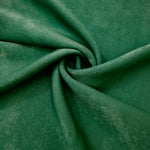 Matte silky sandwashed polyamide fabric in Emerald Green for dresses and apparel