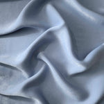 Matte silky sandwashed polyamide fabric in Silver Blue for dresses and apparel