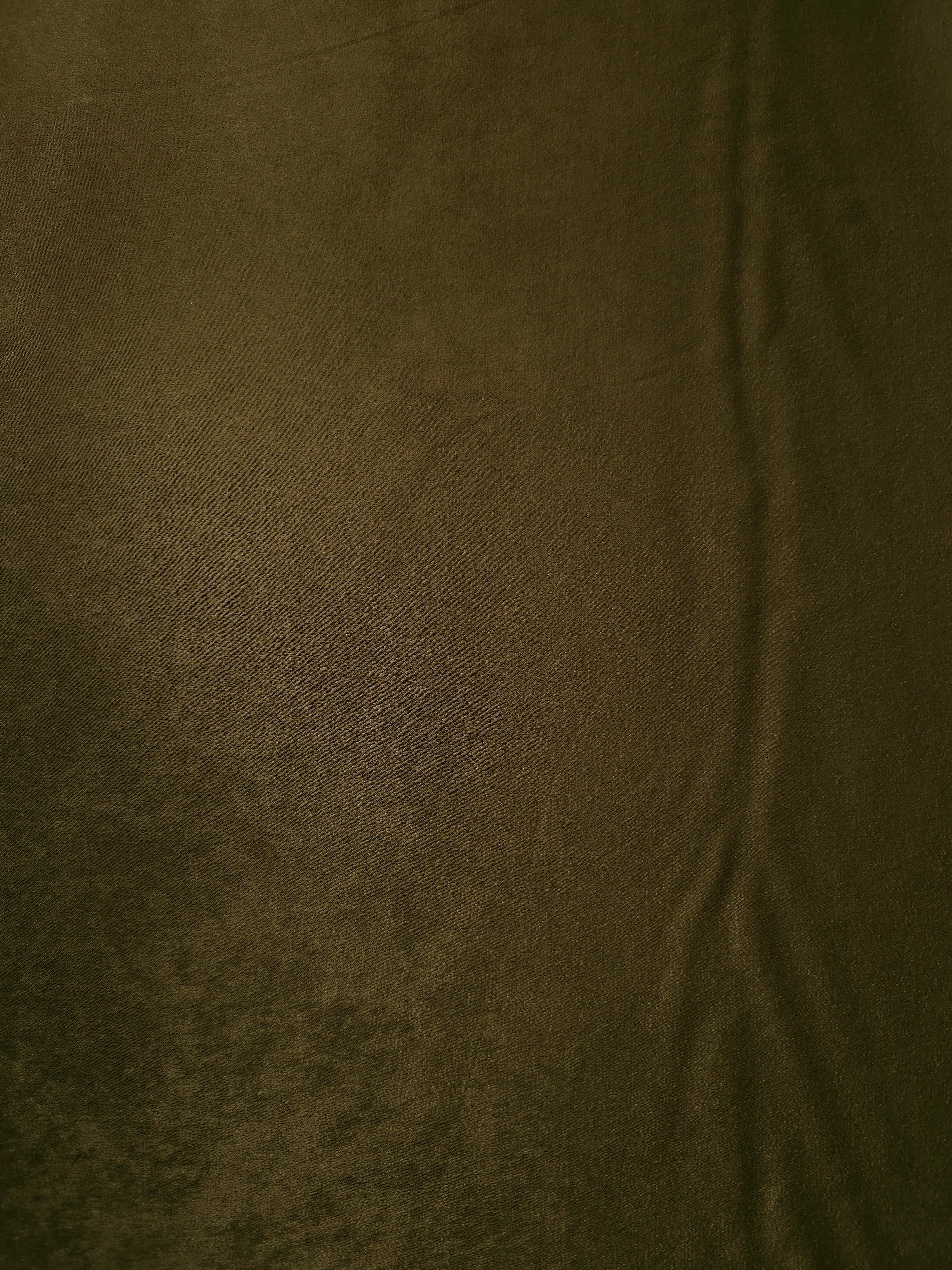 Matte silky sandwashed polyamide fabric in Dark Khaki for dresses and apparel