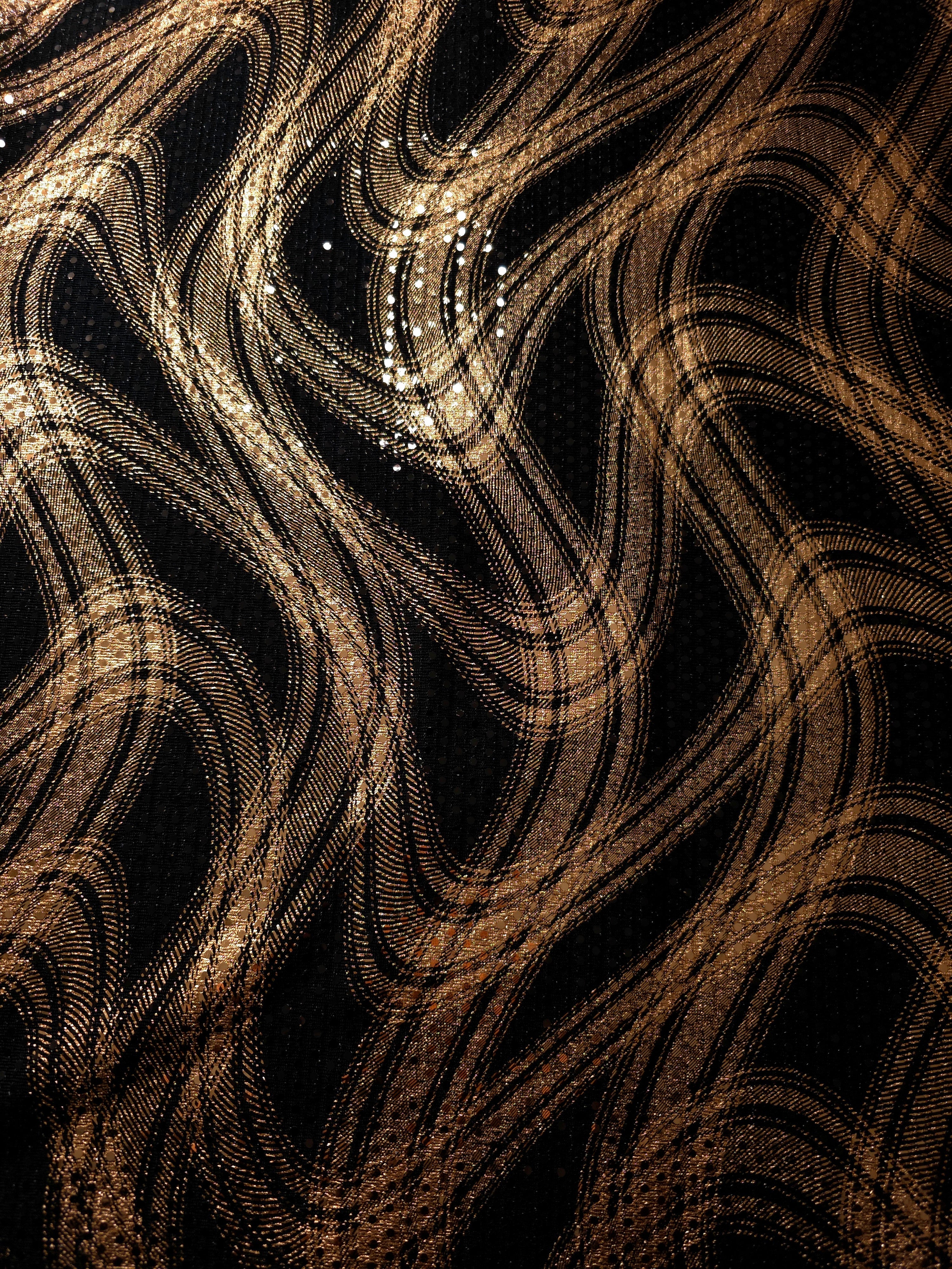 Rose Gold Fluid Waves foil sequin fabric in close detail, highlighting the luminous finish and textured motif for dance costumes, performancewear and fitted bodice accents.