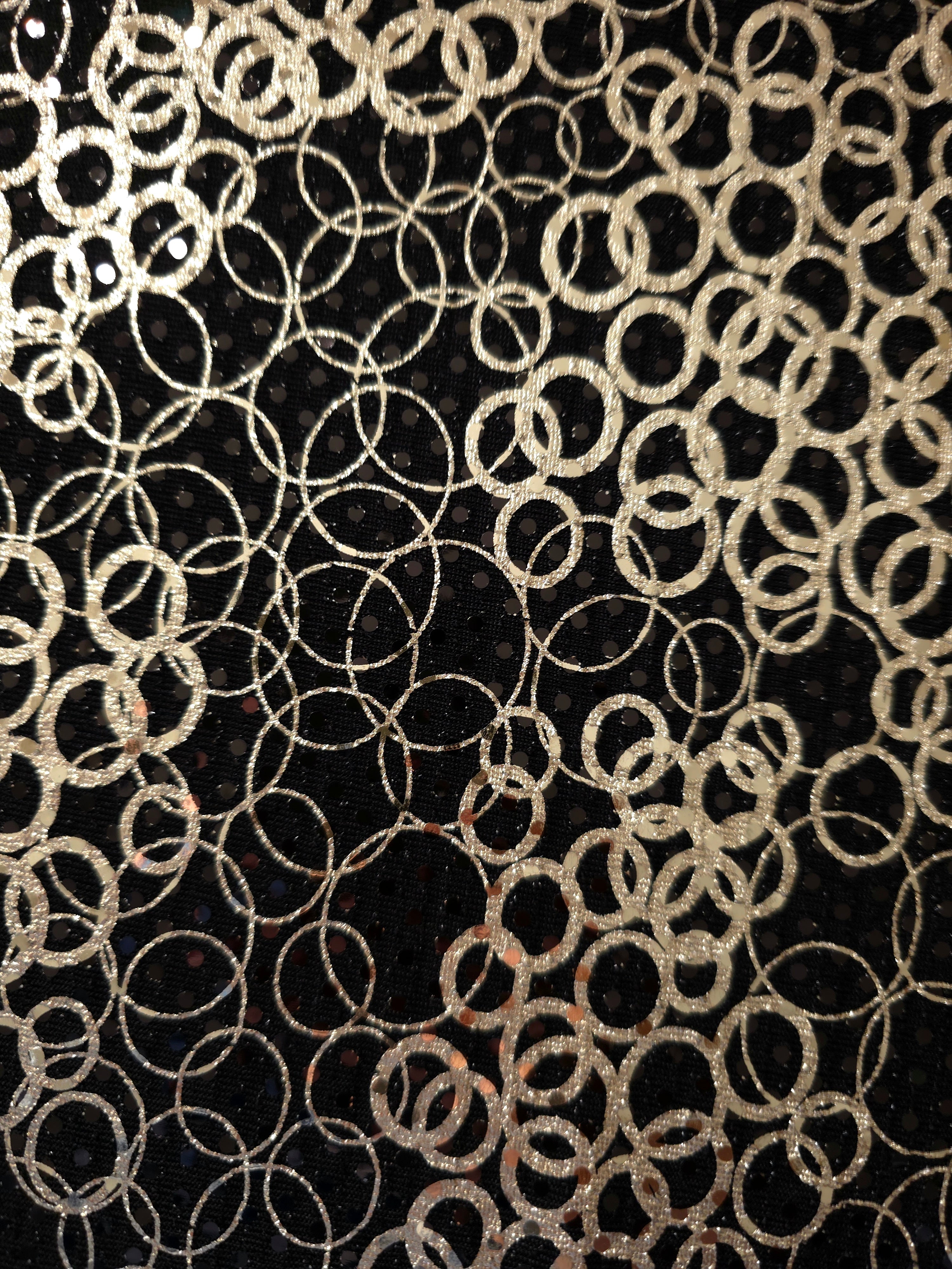 Surface view of Soft Gold Bubble Rings sequin fabric shows metallic pattern definition and textured shine for prom gowns, statement sleeves and fashion accessories.