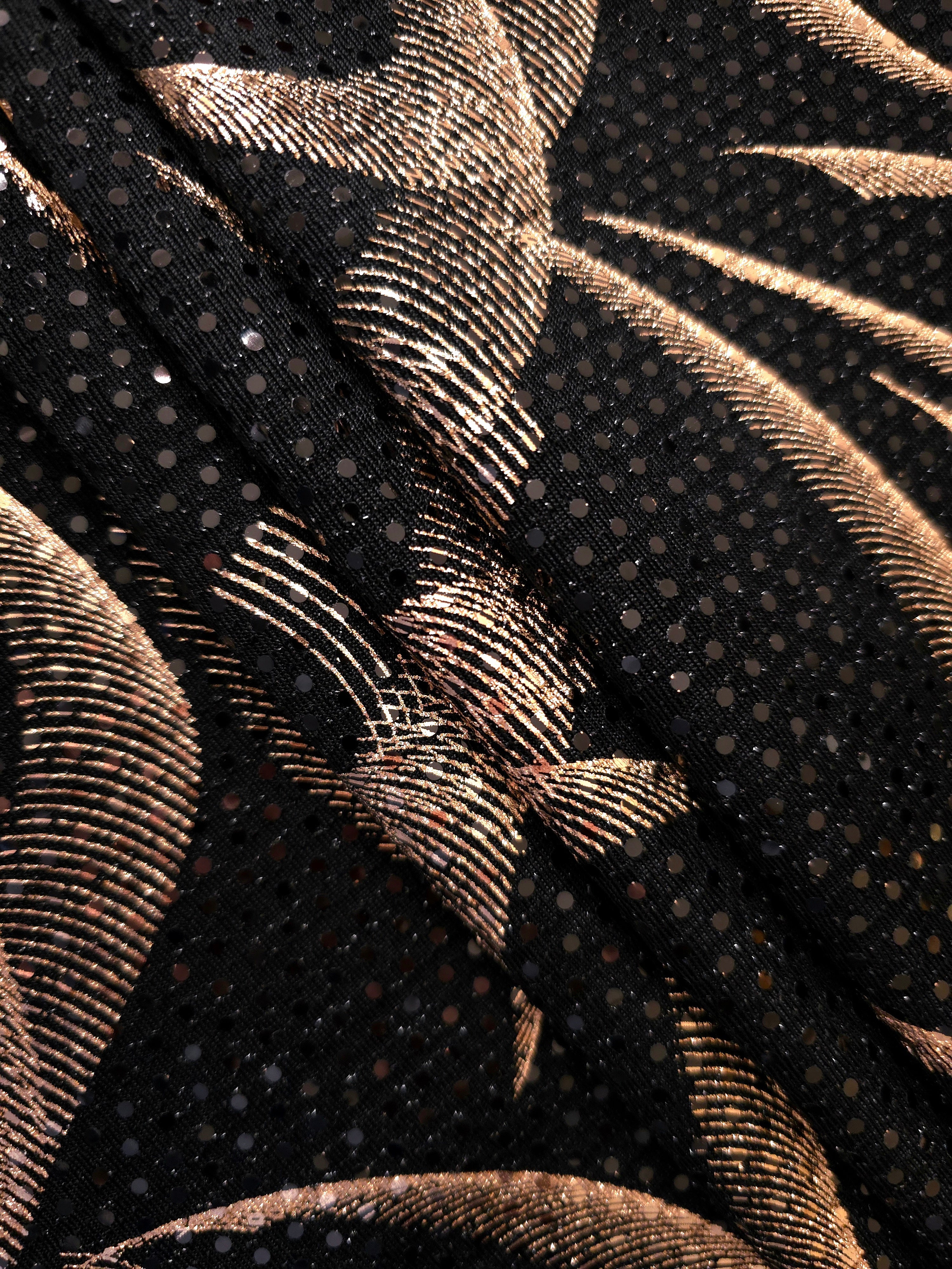 Softly gathered Rose Gold Abstract Ribbon metallic sequin fabric highlights drape, sparkle and dimensional surface detail for special-occasion dresses, sleeves and decorative panels.