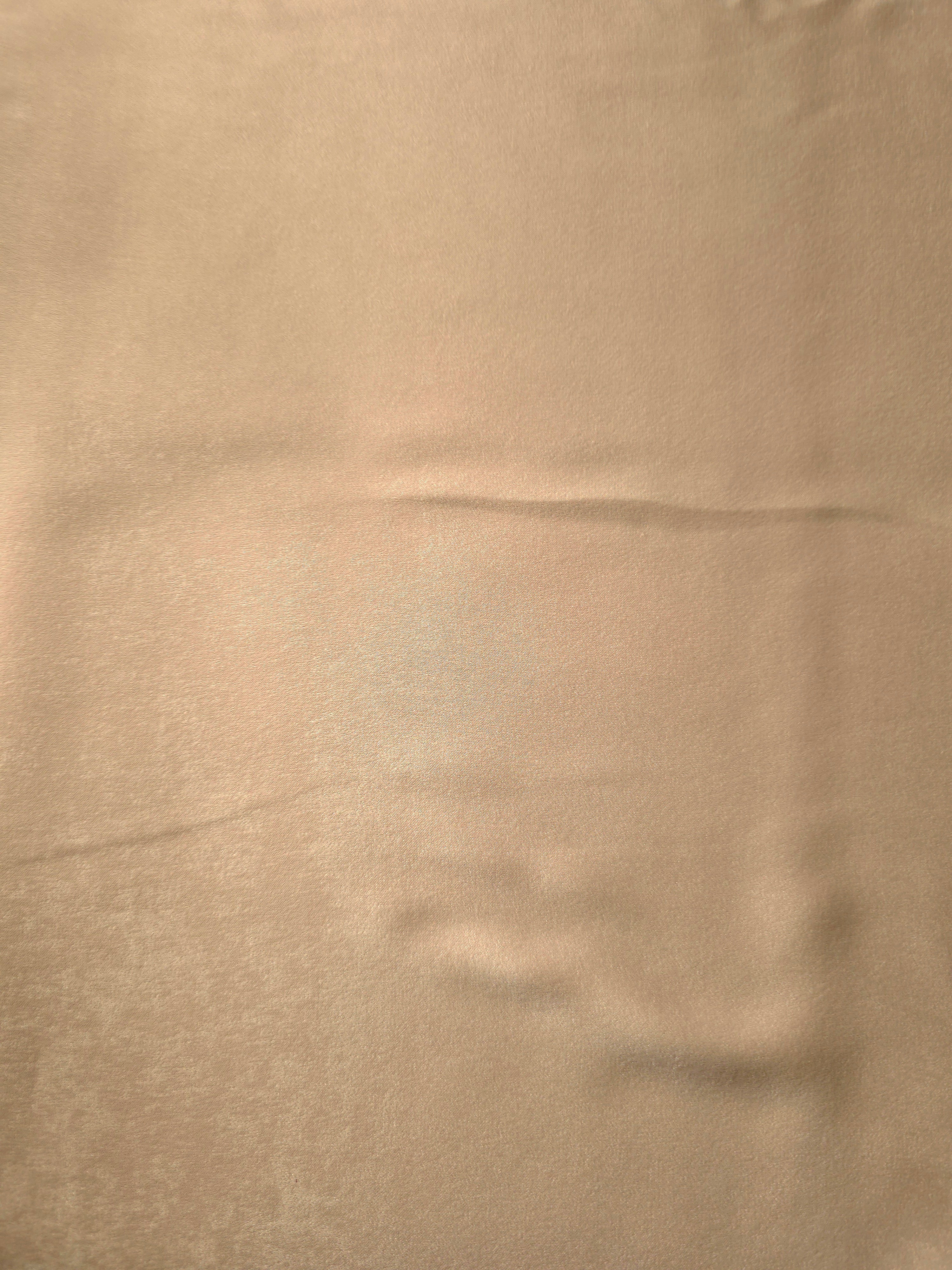 Draped Camel Sand Milano matte sandwashed silky fabric showing fluid movement for dresses and occasionwear